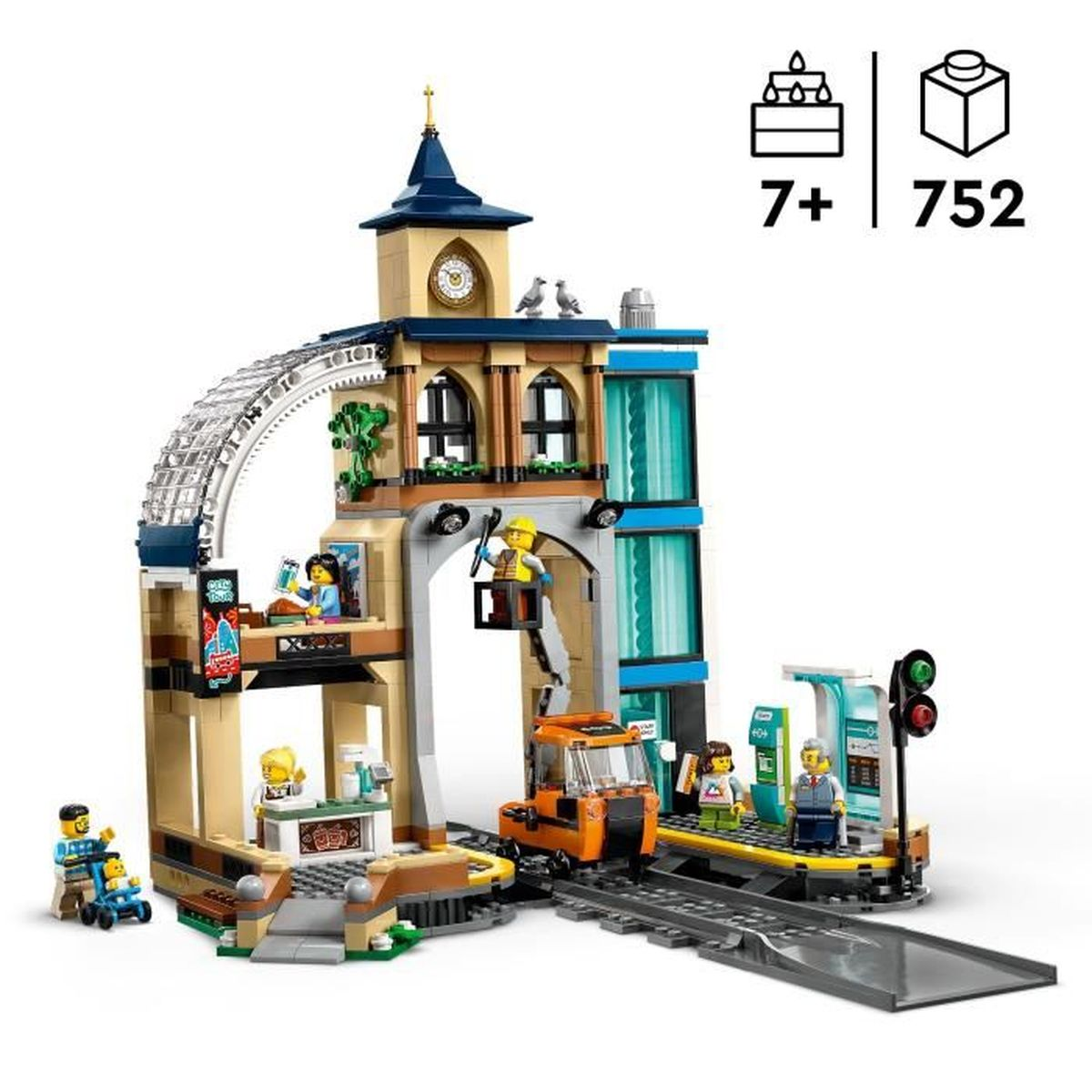 Zestaw Lego City. Dworzec kolejowy z wieżą zegarową, figurkami, pomarańczową ciężarówką, torami i sygnalizacją świetlną. 752 elementy.