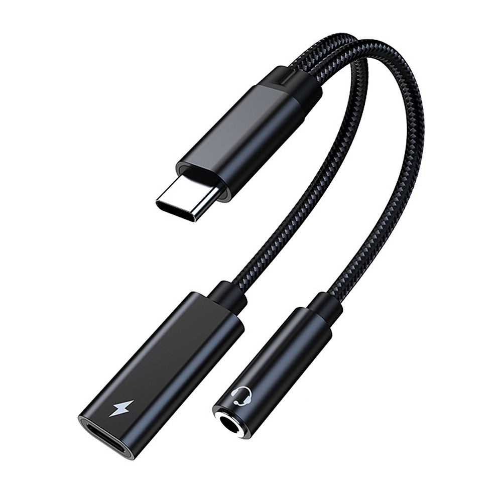 Schwarzer USB-C-zu-Dual-Adapter. Ein Ende hat einen USB-C-Anschluss, das andere einen USB-C-Anschluss und eine 3,5-mm-Kopfhörerbuchse.