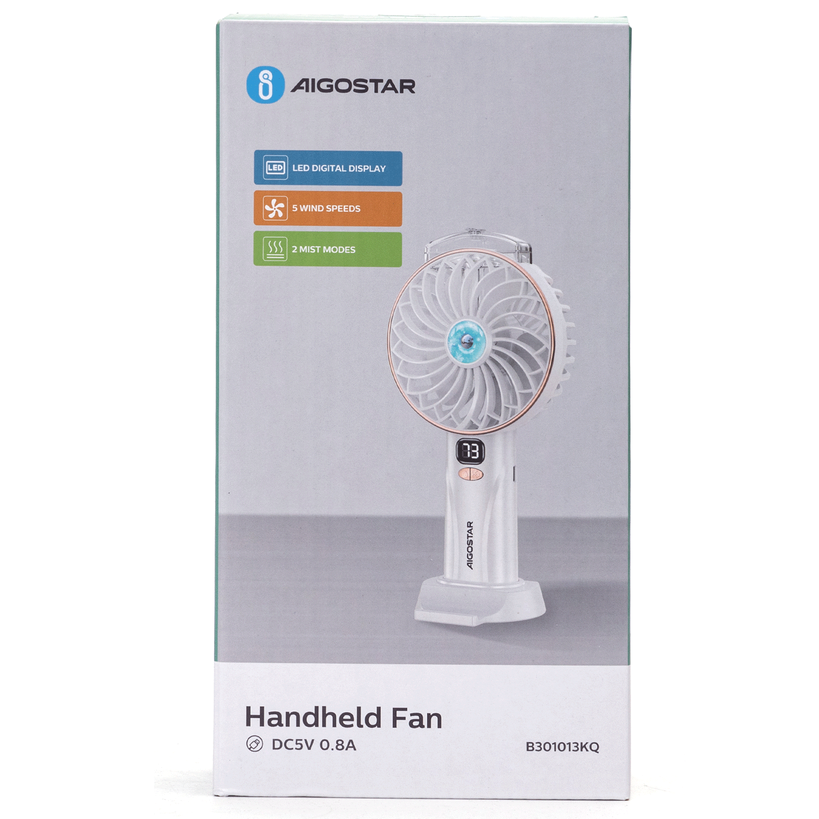 Ventilatore portatile Aigostar in scatola. Ha display a LED, 5 velocità e 2 modalità di nebulizzazione. Accenti bianchi e oro rosa.