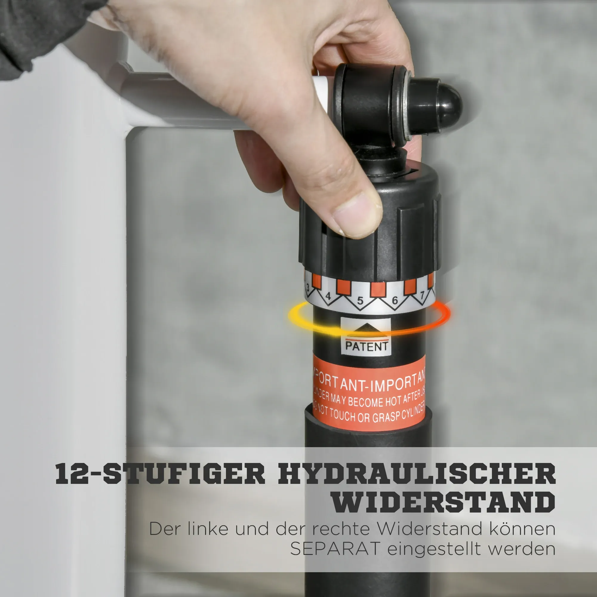 Hand justiert einen schwarzen Hydraulikdämpfer. Zahlen 4-7 sind sichtbar. Text: 12-stufiger hydraulischer Widerstand. Patentaufkleber.