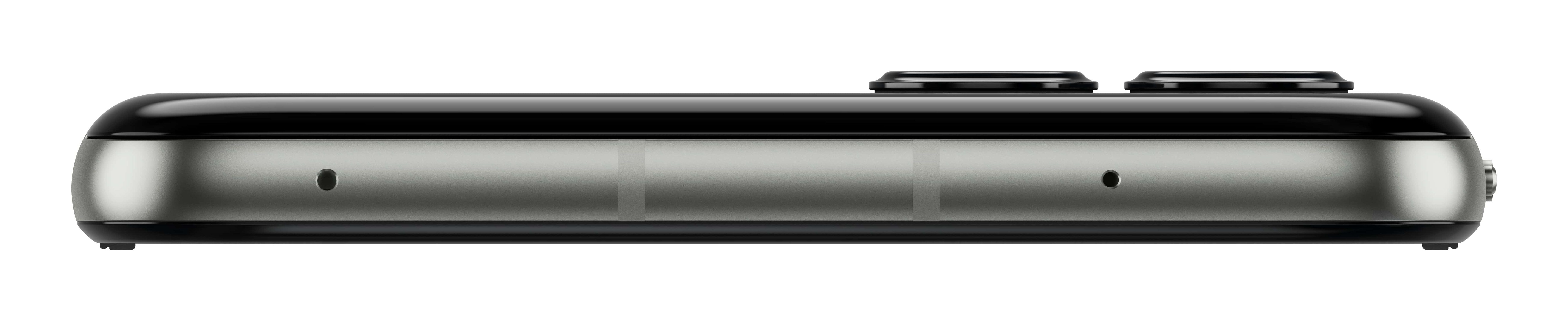 Zbliżenie boku urządzenia. Posiada błyszczącą czarną górę, srebrny korpus i dwa czarne przyciski.