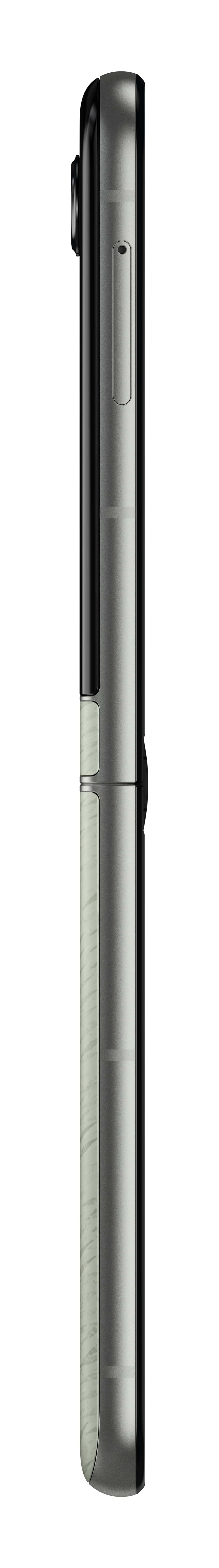 Widok z boku smartfona. Ma czarne, szare i wzorzyste sekcje. Widoczny jest przycisk i aparat.