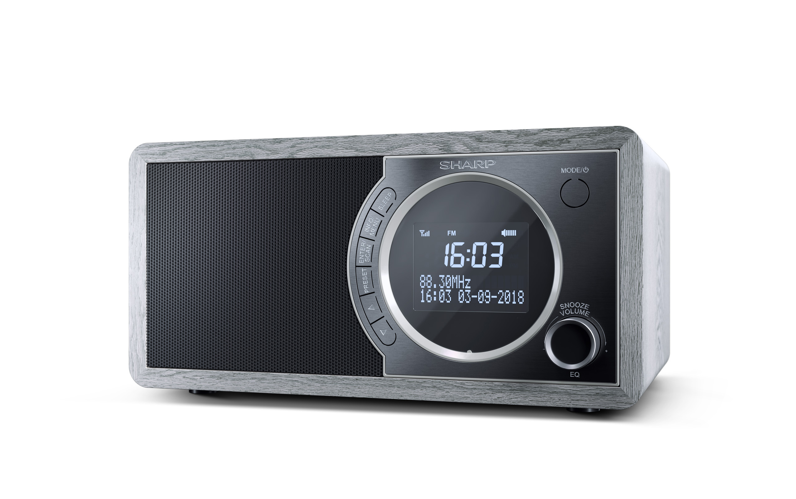 A Sharp radio with a digital clock and display showing time, date, and radio frequency. It has a gray wood-grain finish.