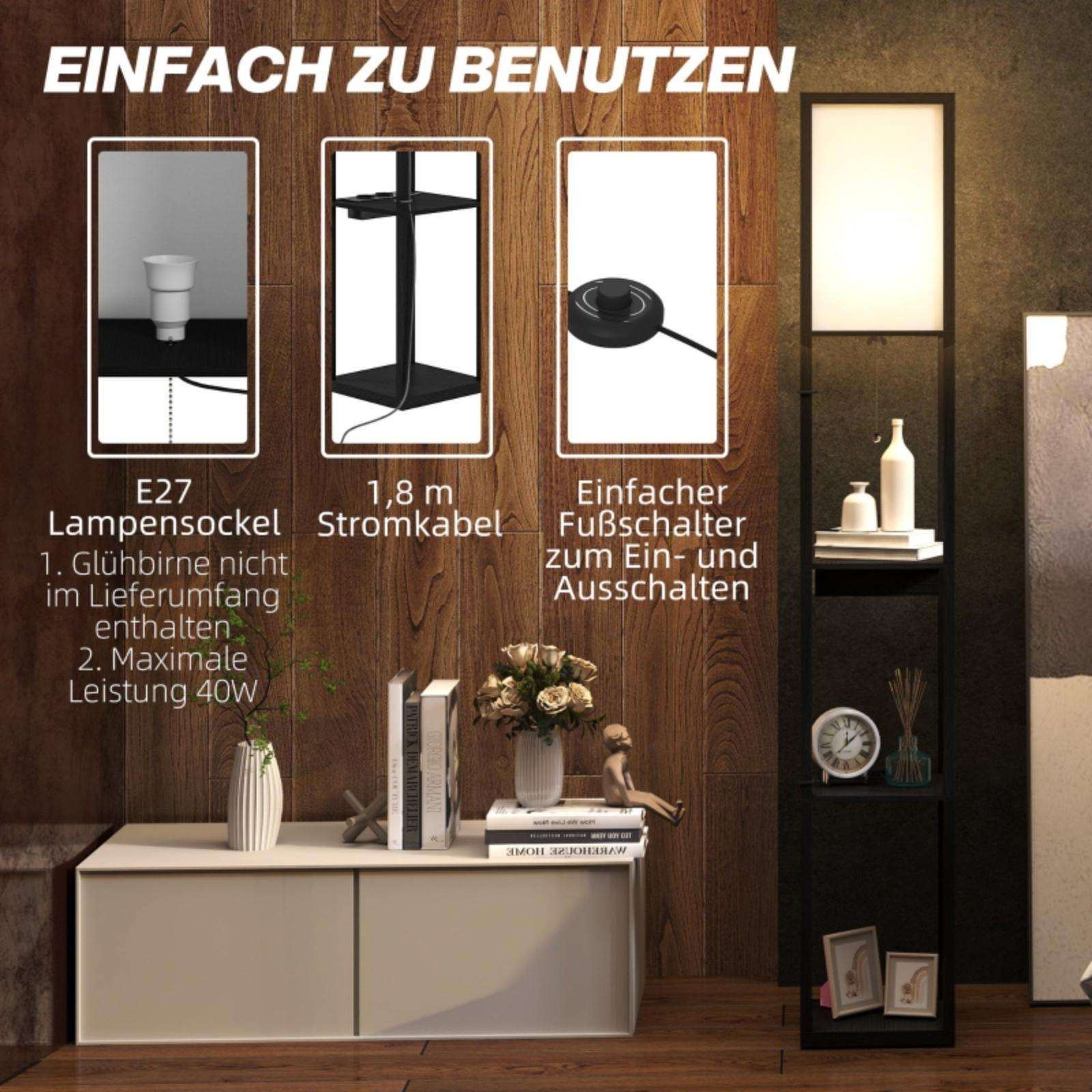 Eine schwarze Stehlampe mit weißem Schirm, ein Beistelltisch mit Büchern und Dekoration und eine Holzwand.