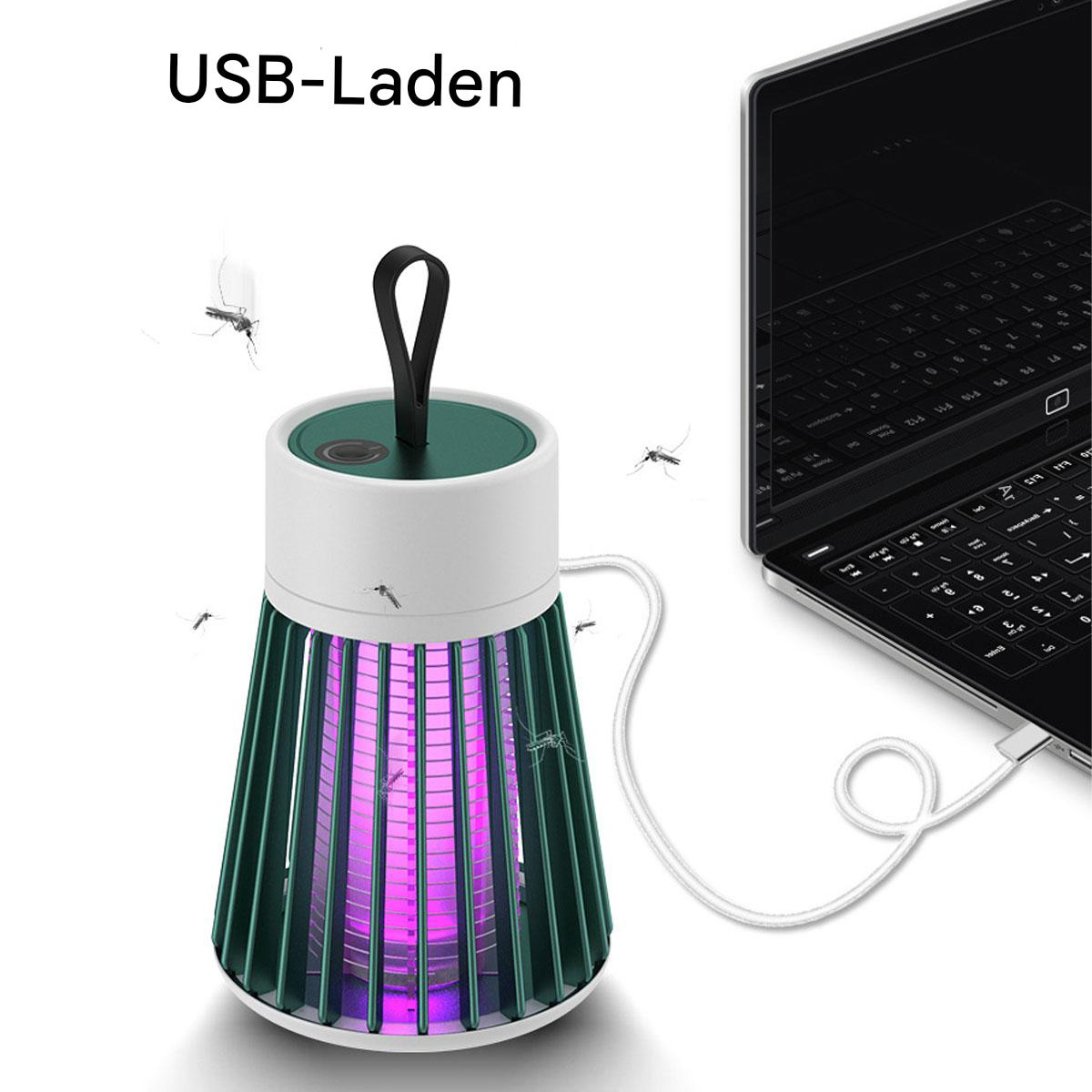 Moskitofalle, die per USB an einen Laptop angeschlossen ist. Die Falle ist grün und weiß, mit lila Licht. Mücken fliegen herum.