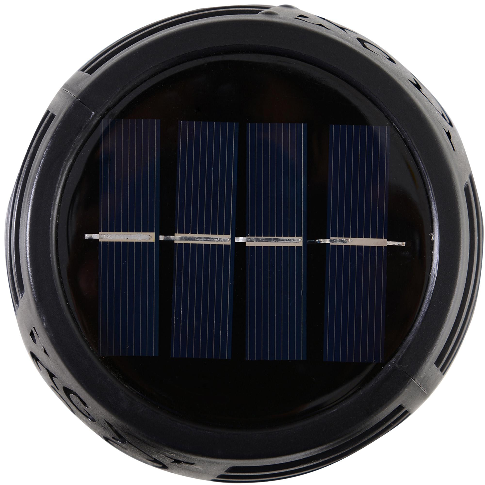 Runder, schwarzer Solarpanel mit vier rechteckigen Abschnitten dunkler, blauer Zellen. Das Panel ist in einem schwarzen Rahmen.