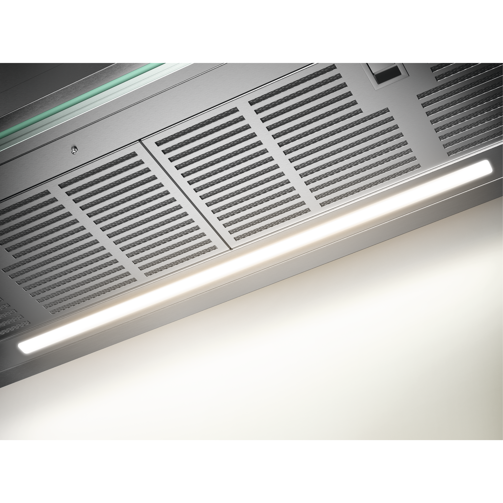 Primer plano de una campana extractora moderna. Tiene un acabado de acero inoxidable y luz LED brillante.
