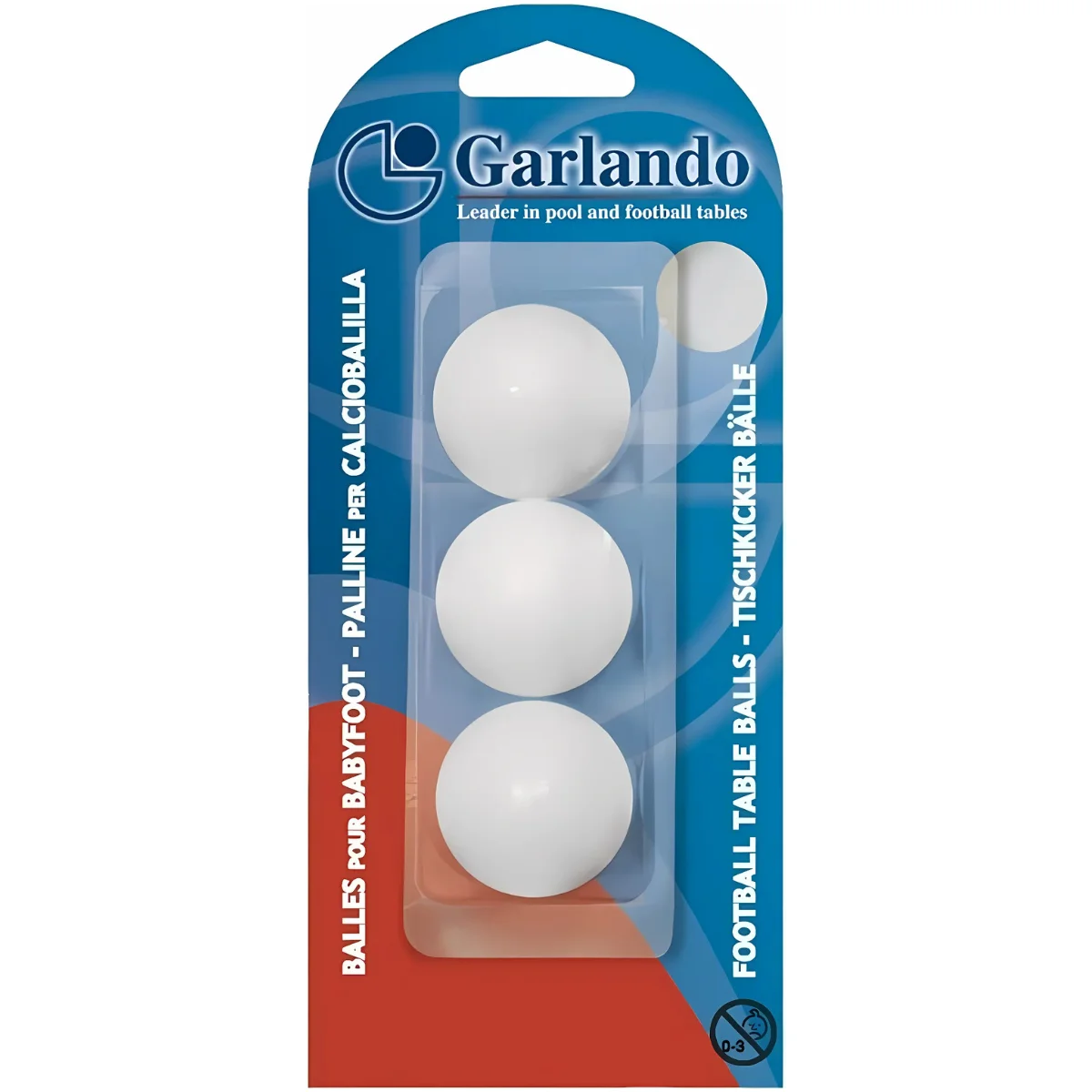 A package of three white table football balls is displayed. The package is blue and red, with the brand name Garlando.