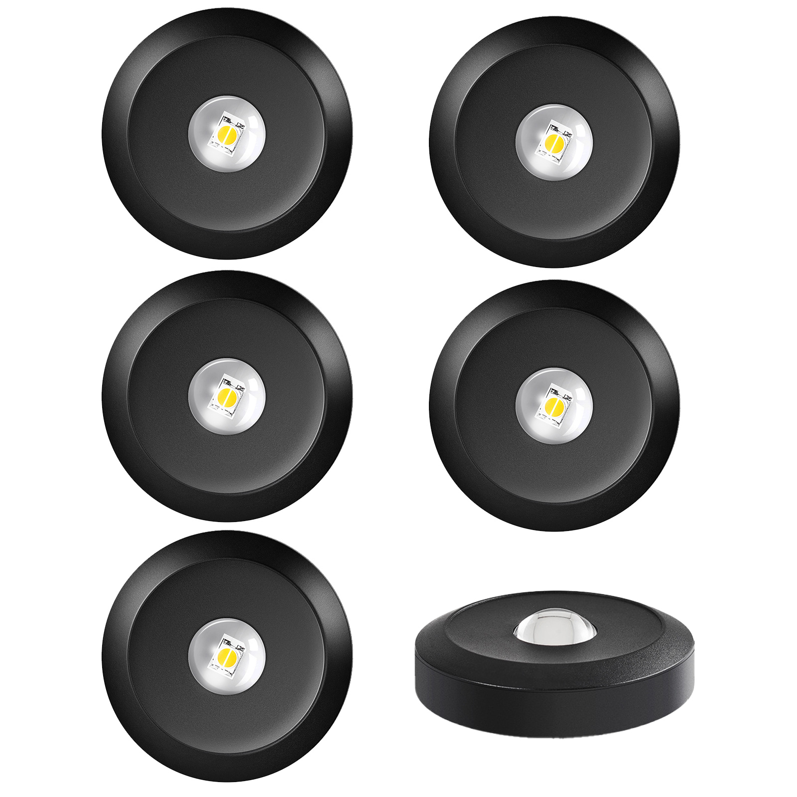 Mehrere schwarze, runde LED-Leuchten mit einem zentralen hellgelben und weißen Licht auf weißem Hintergrund.
