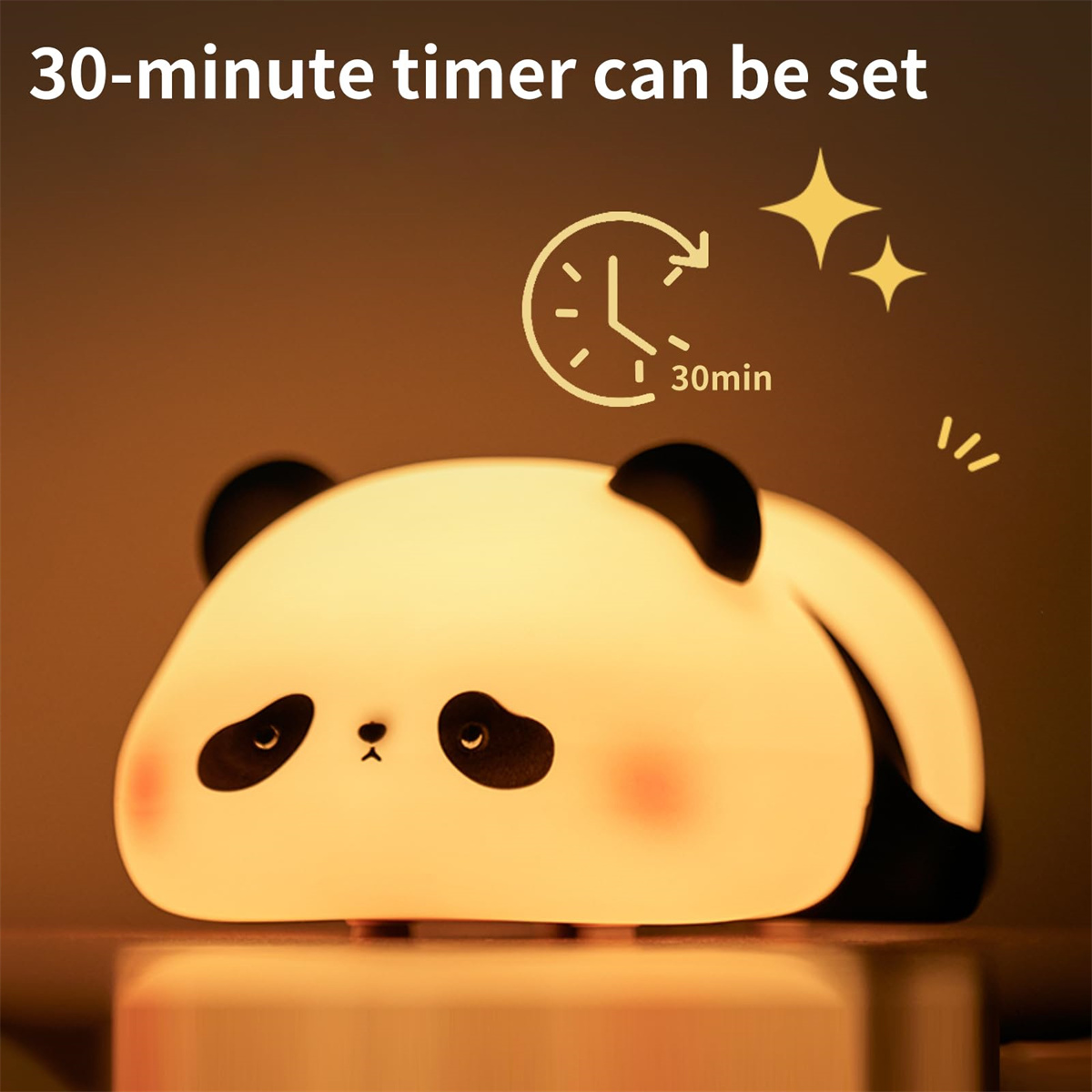 Ein panda-förmiges Nachtlicht mit 30-Minuten-Timer. Das Licht ist weich und leuchtend, mit schwarzen Ohren und Augen und einem süßen Gesichtsausdruck.