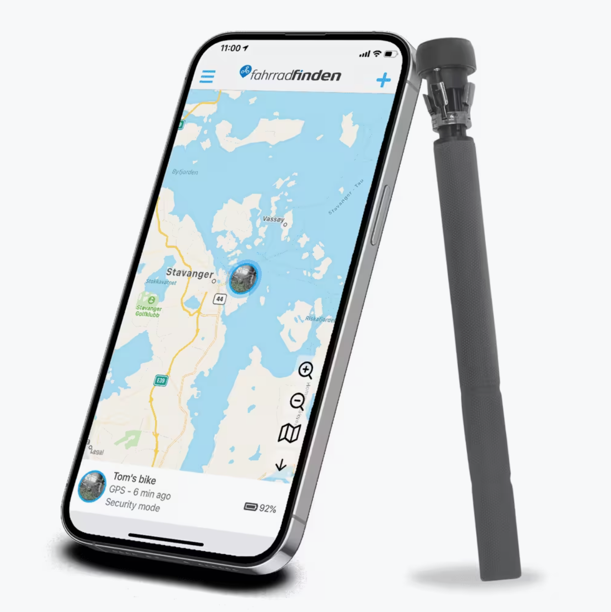 Ein Smartphone zeigt eine Karte mit dem Standort eines Fahrrads. Ein graues Fahrradschloss steht neben dem Telefon. Das Telefon zeigt eine Karte mit einem Fahrradstandort.