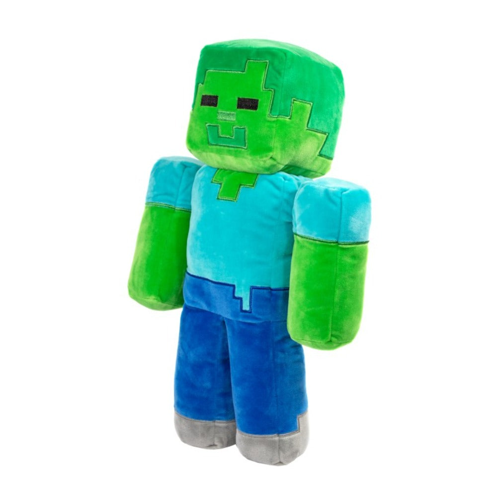 Ein Minecraft-Zombie-Plüschtier. Es hat einen grünen, quadratischen Kopf, grüne Arme, ein blaues Hemd und eine Hose. Der Hintergrund ist weiß.