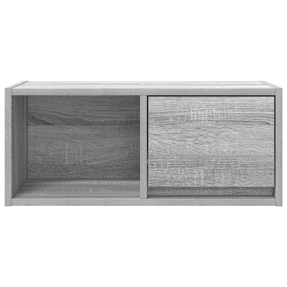 Ein graues Holzregal mit einem offenen und einem geschlossenen Fach. Die Holzmaserung ist sichtbar.