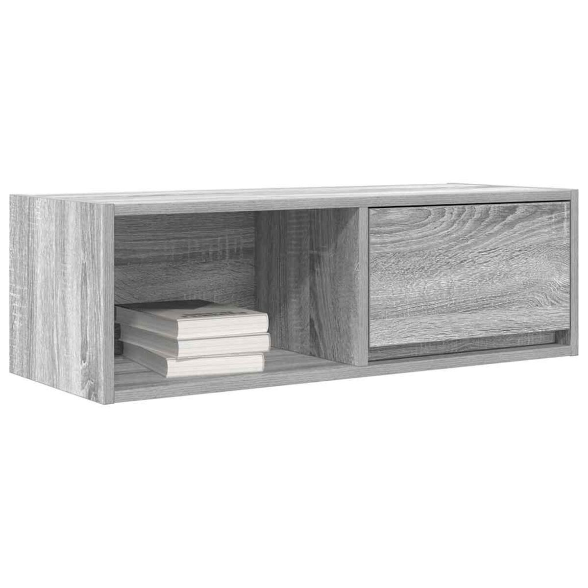 Ein graues Wandregal aus Holz mit drei Büchern im linken Fach und einer geschlossenen Tür rechts.