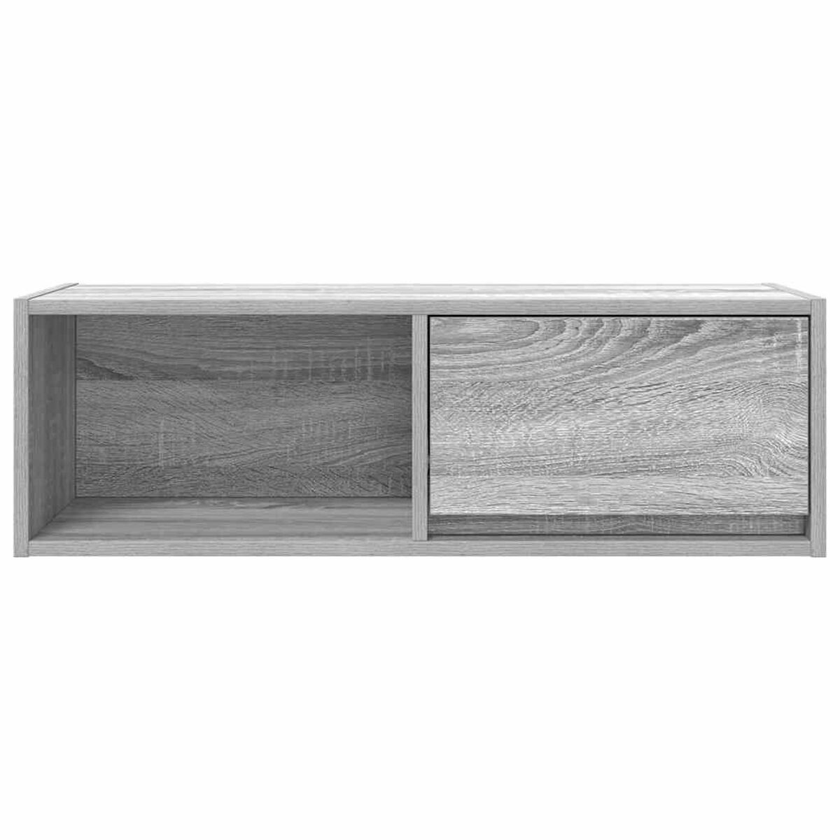 Ein rechteckiger, grauer Holzschrank mit einem offenen Fach links und einer geschlossenen Tür rechts, Holzmaserung sichtbar.