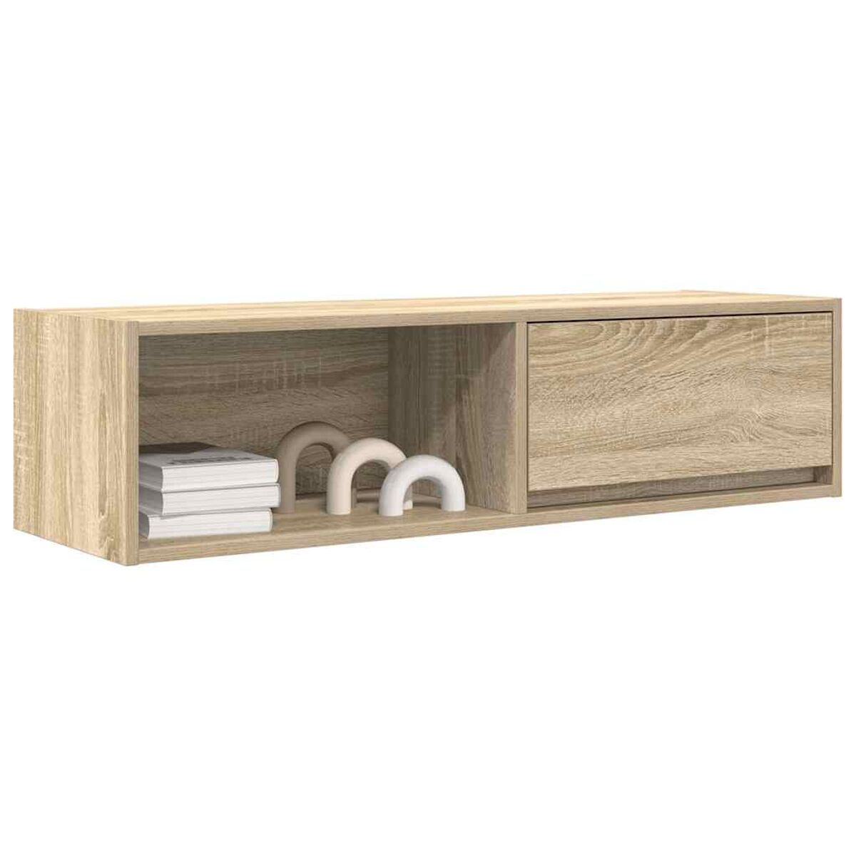 Ein helles Wandregal aus Holz mit einem offenen Fach mit Büchern und Bögen und einem geschlossenen Fach mit einer Schublade.