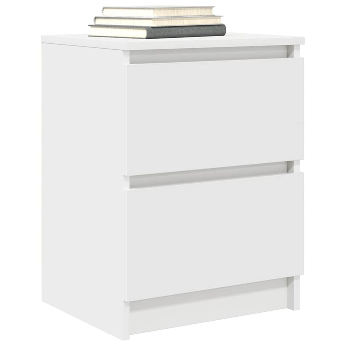 Ein weißer Nachttisch mit zwei Schubladen. Oben liegen drei Bücher. Der Nachttisch befindet sich in einem Studio.