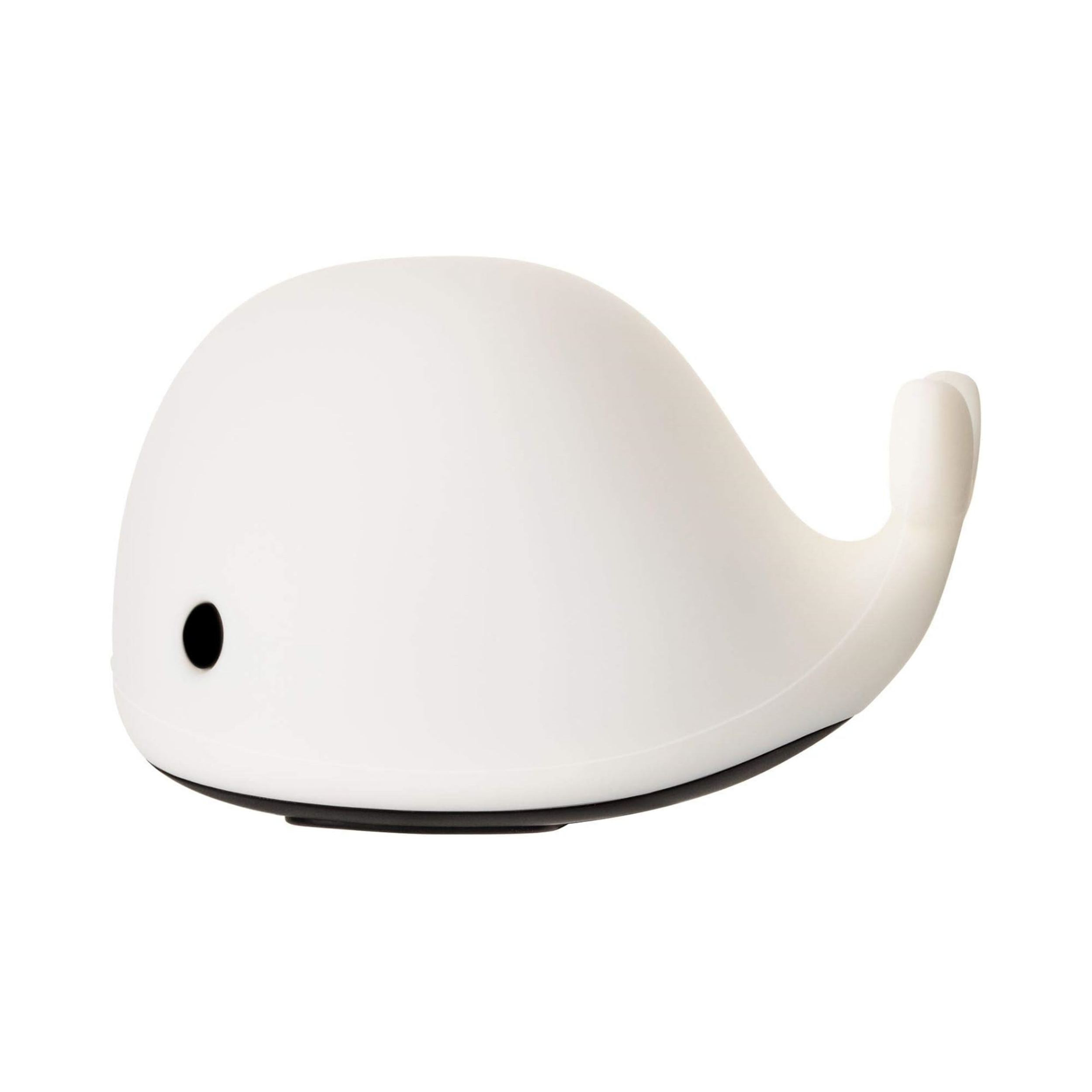 Eine weiße Wal-Lampe. Sie hat ein schwarzes Auge und einen schwarzen Sockel. Die Schwanzflosse ist oben.