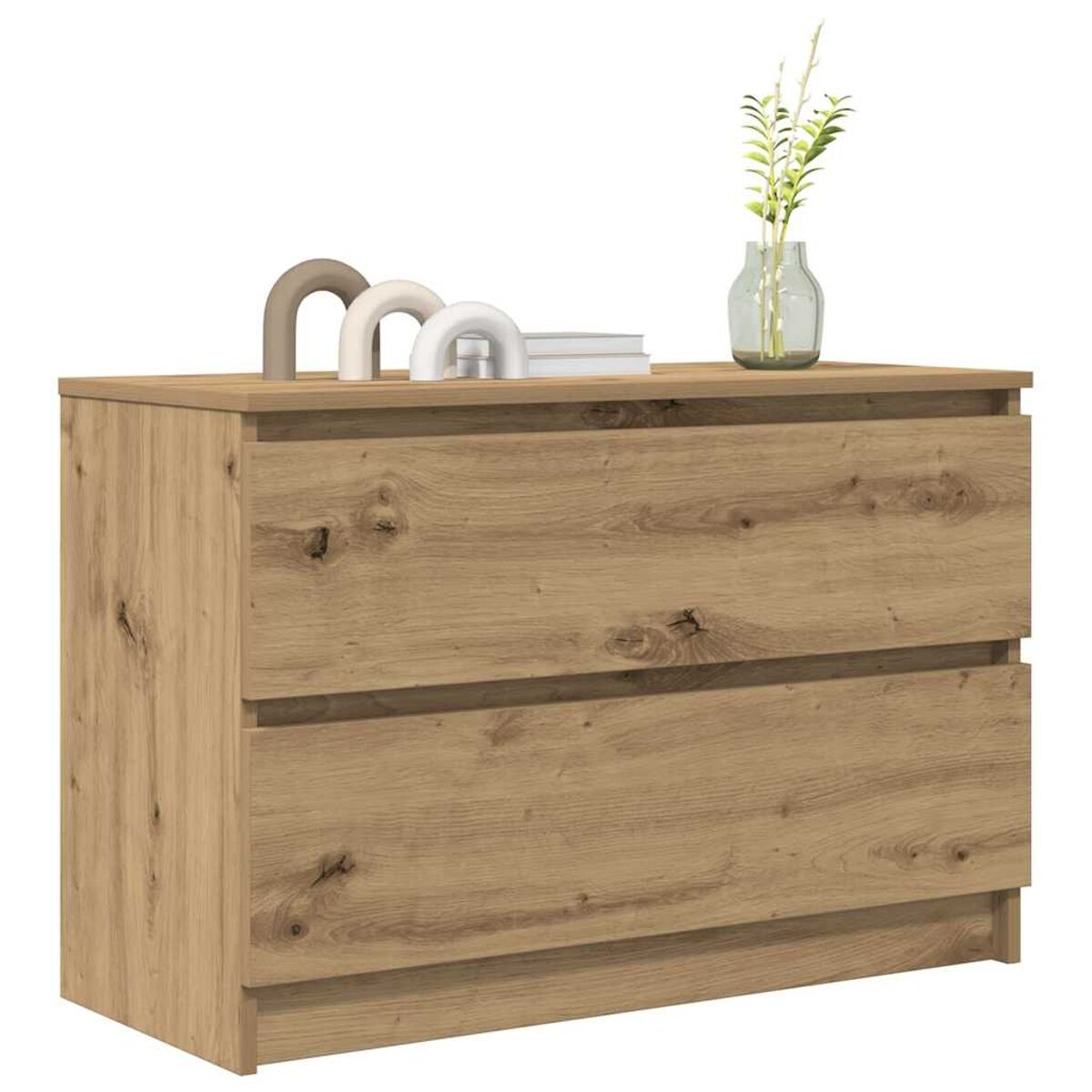 Holzkommode mit zwei Schubladen. Oben befinden sich dekorative Bögen, Bücher und eine Vase mit Pflanzen. Helle Holzfarbe.