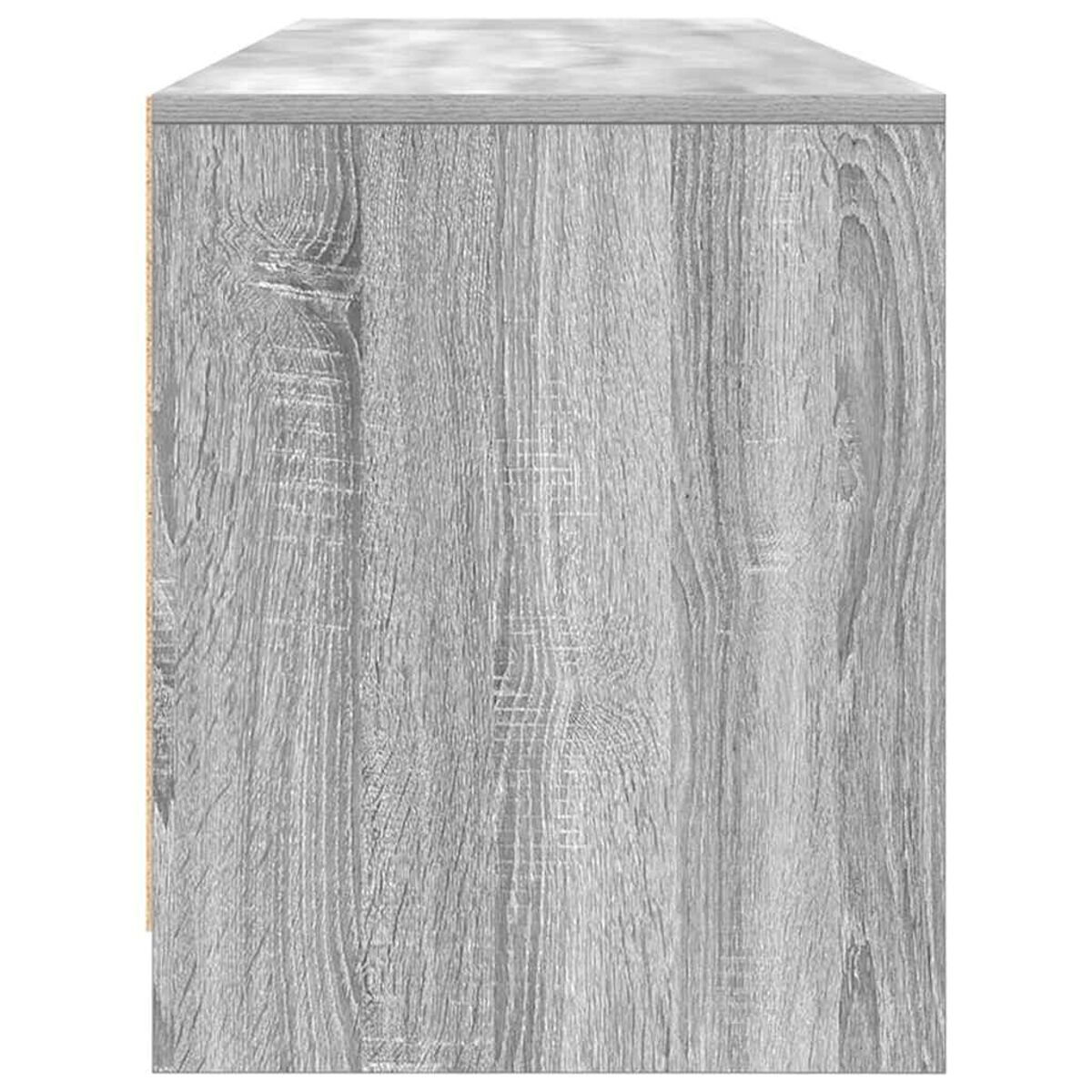 Nahaufnahme eines grauen Holzschranks. Die Oberseite ist hellgrau, und die Holzmaserung ist an den Seiten sichtbar.