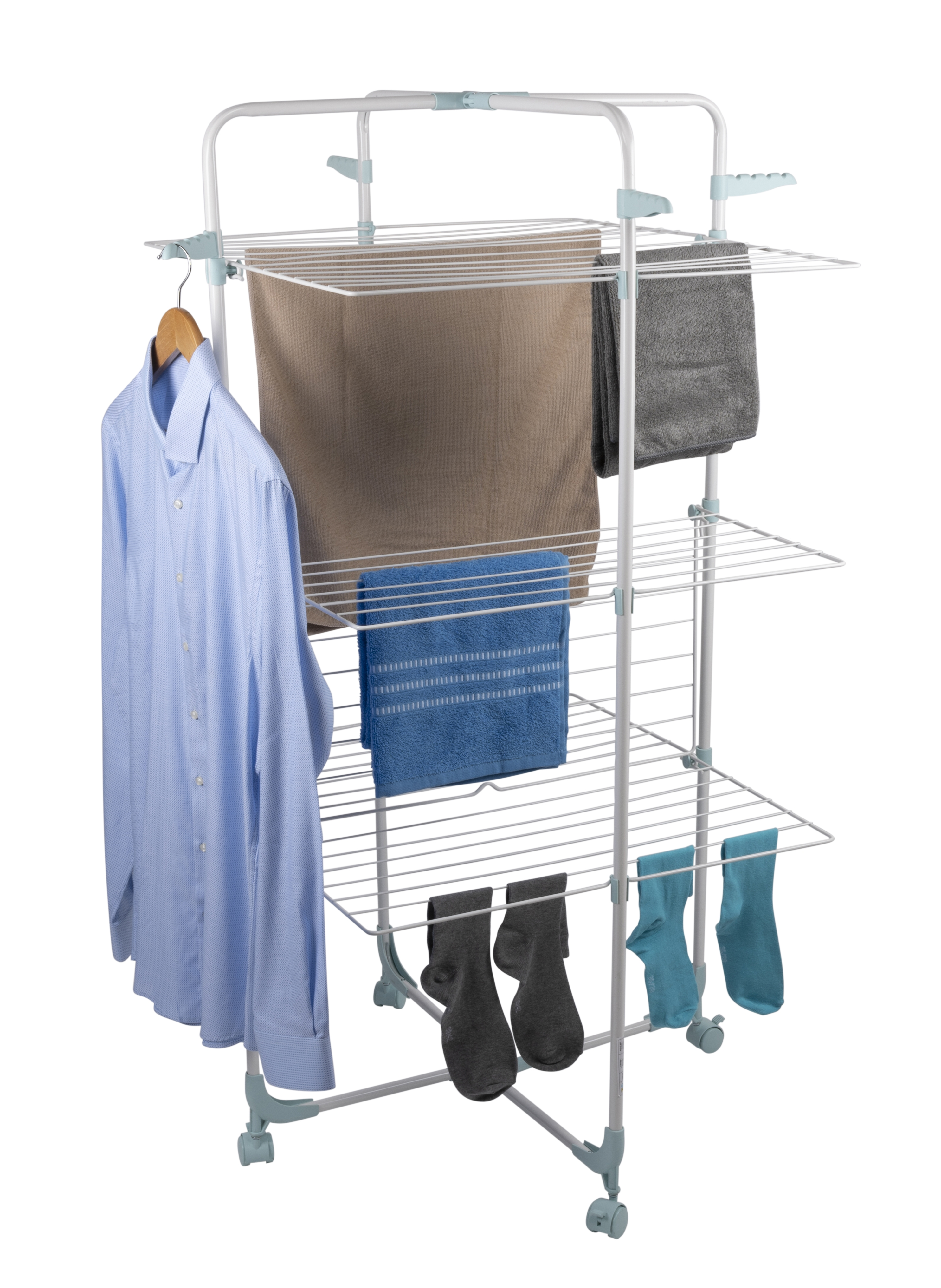 A clothes drying rack with various items: a blue shirt, brown towel, gray towel, blue towel, gray socks, and blue socks.