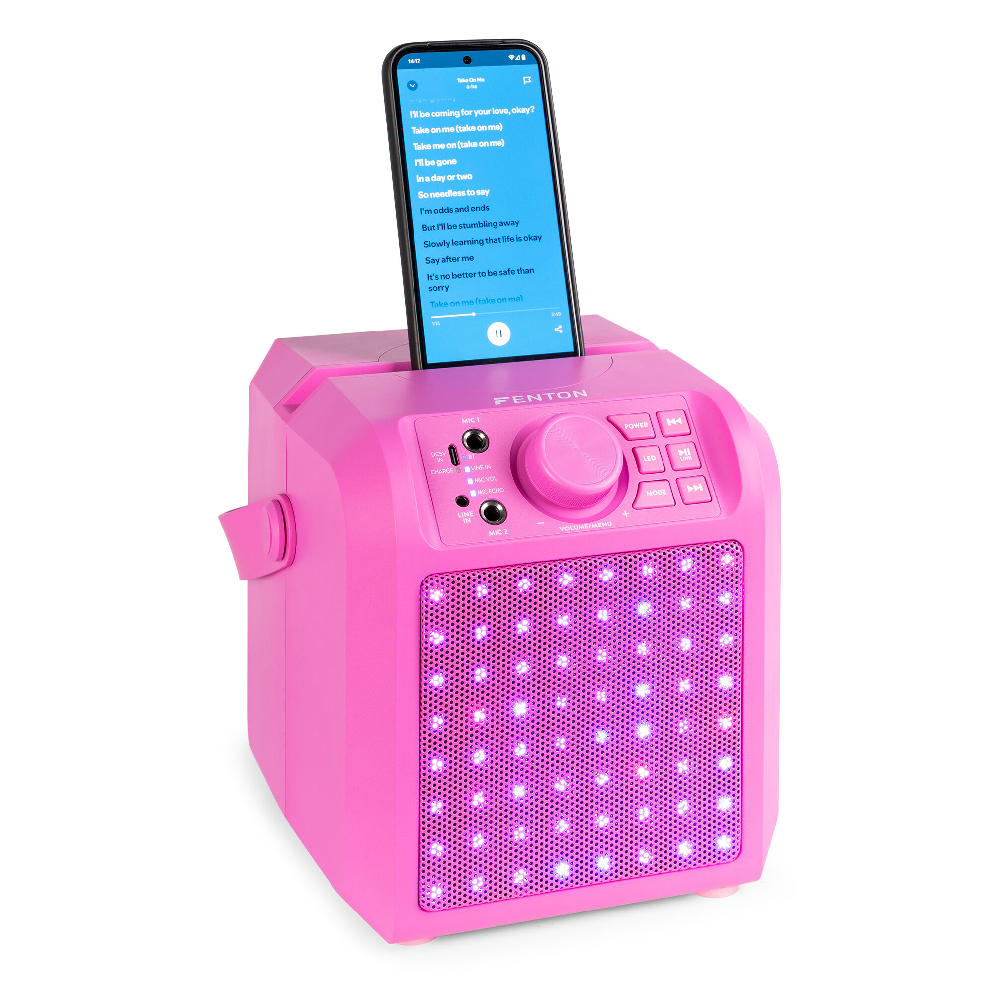 Altavoz rosa con teléfono mostrando letras. El teléfono está en la ranura del altavoz. Las luces están encendidas.