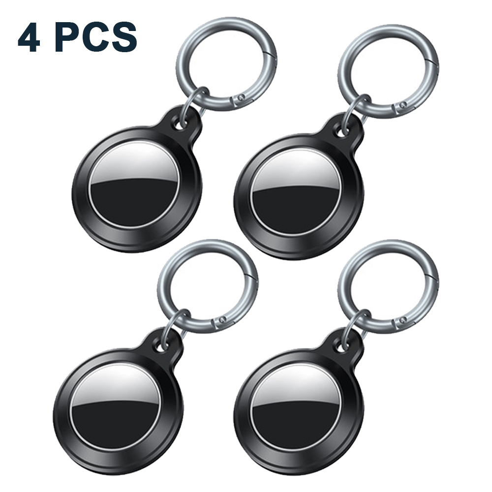Vier schwarze Schlüsselanhänger mit silbernen Ringen, beschriftet mit '4 PCS'. Jeder Anhänger hat eine reflektierende silberne Mitte.