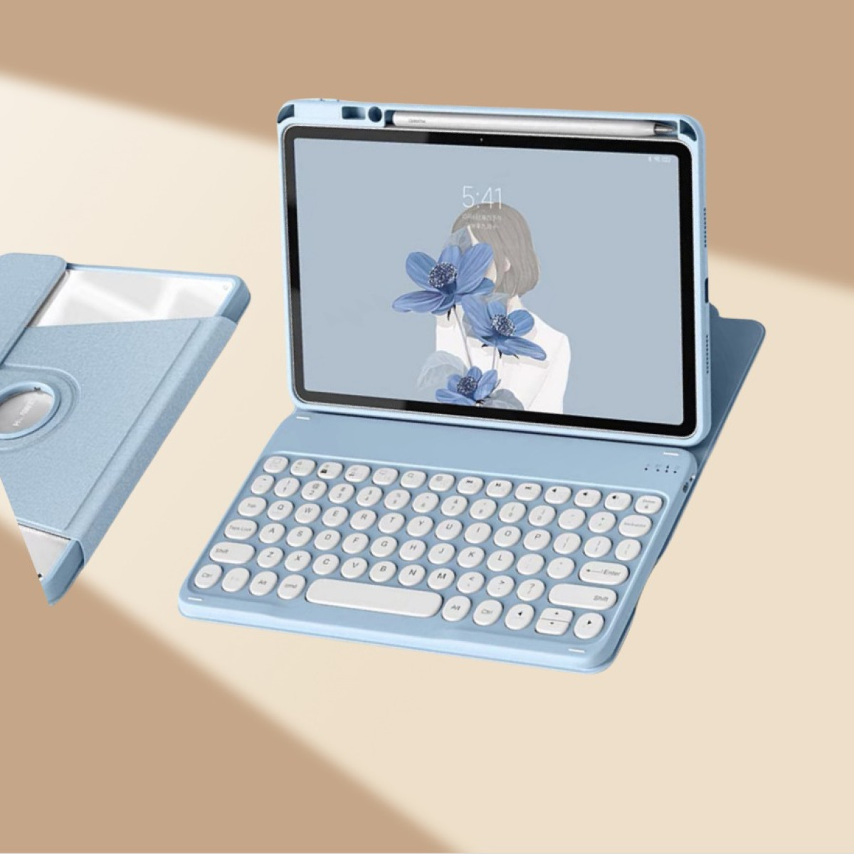 Ein blaues Tablet mit Tastatur ist geöffnet und zeigt einen Bildschirm mit einer Frau und blauen Blumen. Links ist eine geschlossene Tablethülle.