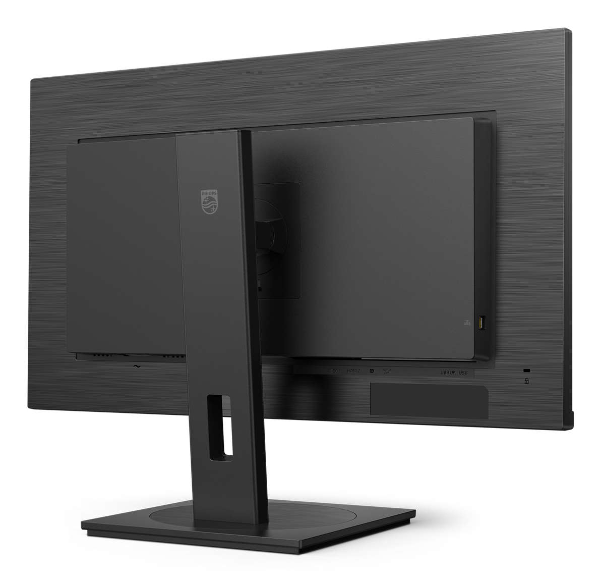 Widok z tyłu czarnego monitora Philips. Ma podstawkę, porty i logo Philips. Monitor stoi na białej powierzchni.