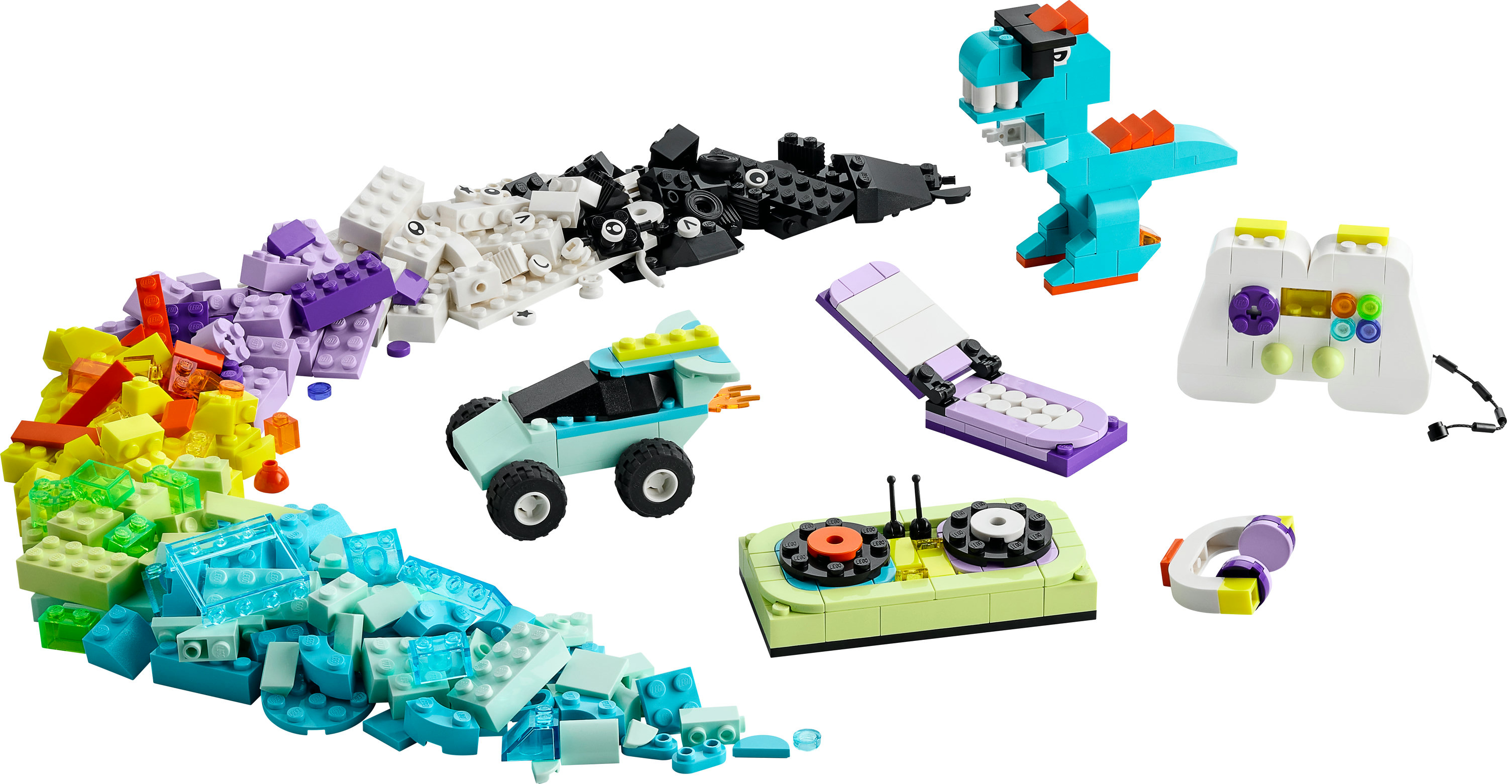 Bir araba, dinozor, kumanda ve kulaklık dahil olmak üzere Lego tuğlaları ve monte edilmiş modellerin koleksiyonu.