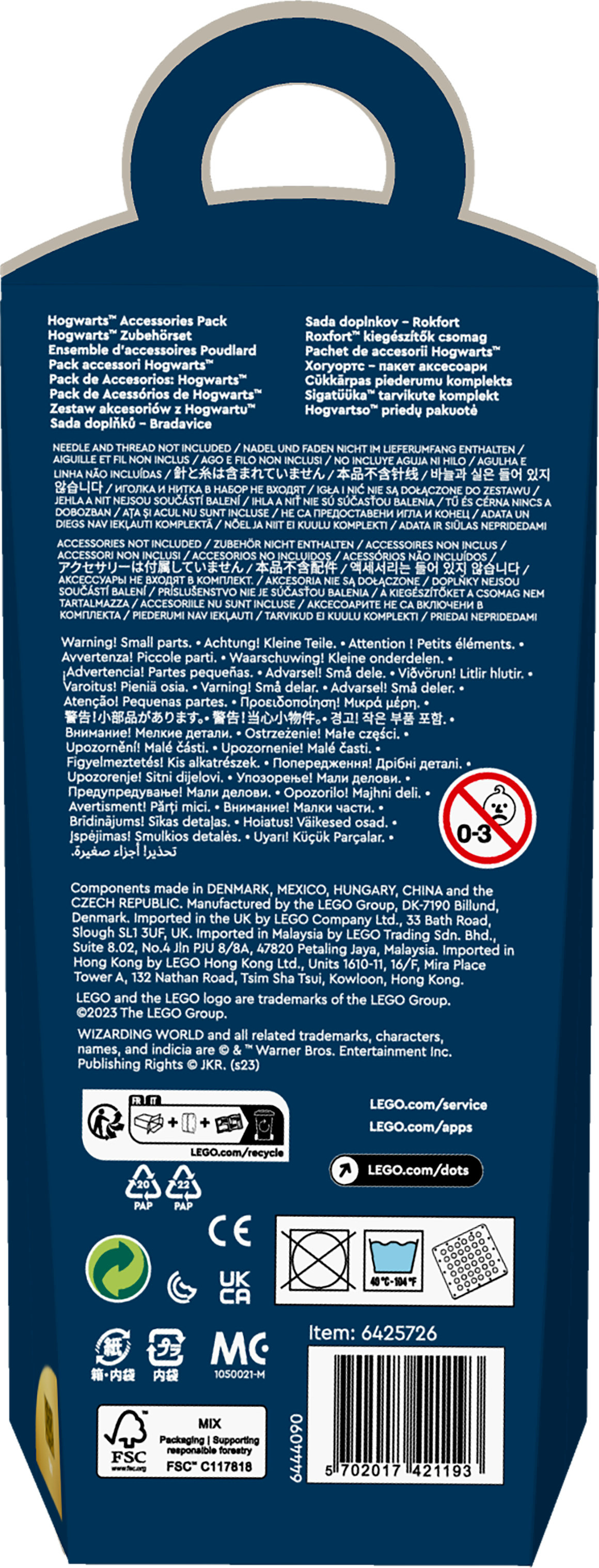 Pudełko Lego z tekstem w wielu językach, logo recyklingu i ostrzeżeniem o małych częściach.