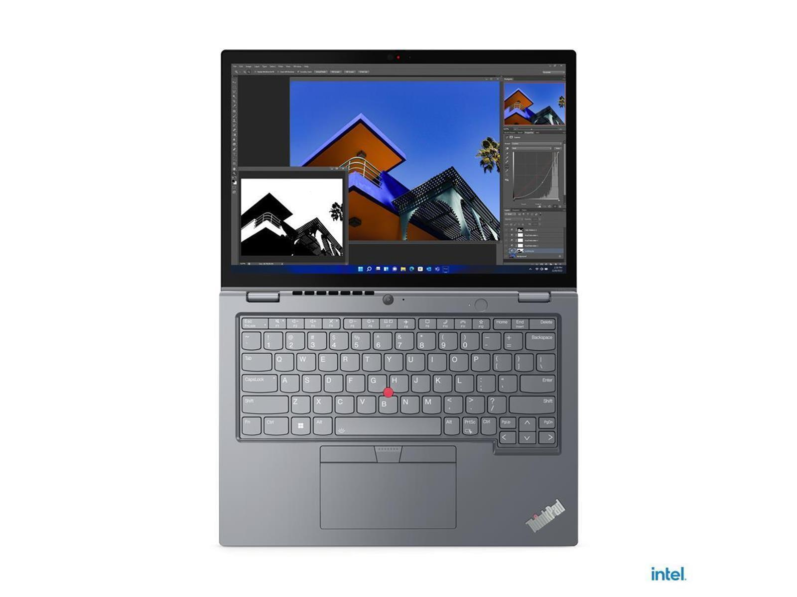 Laptop mit geöffneter Foto-Bearbeitungssoftware. Mehrere Fenster sind geöffnet. Tastatur und Touchpad sichtbar. Intel-Logo unten.