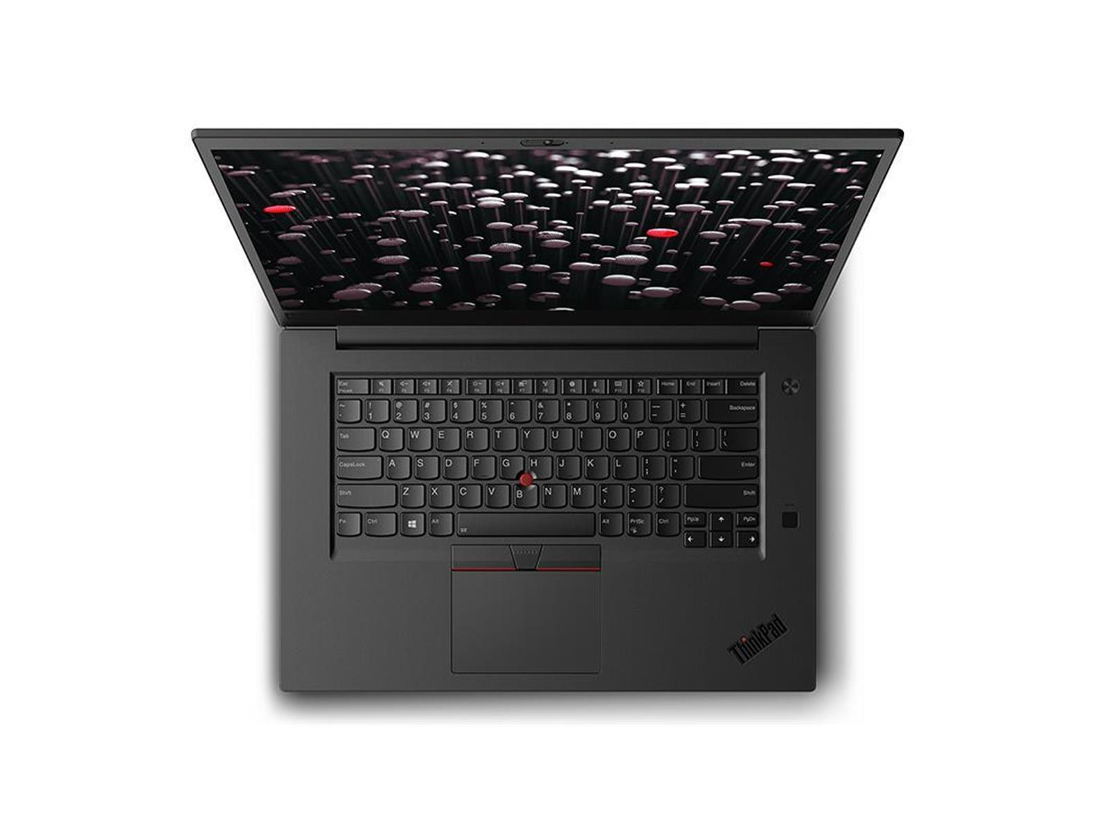 Draufsicht auf ein geöffnetes schwarzes ThinkPad-Laptop. Der Bildschirm zeigt einen dunklen Hintergrund mit roten und schwarzen Formen.