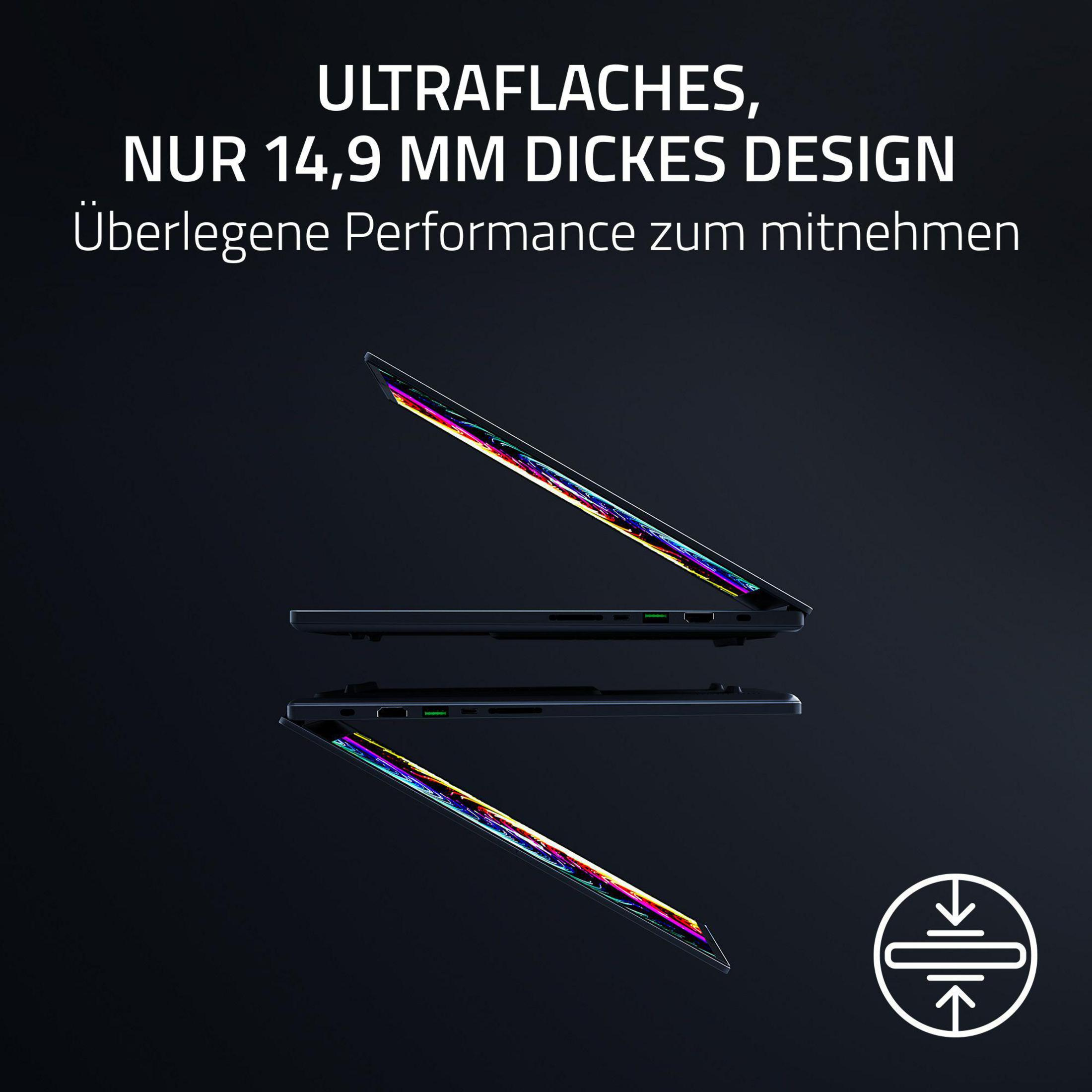 Schwarze Laptops sind auf dunklem Hintergrund gestapelt. Die Bildschirme haben farbenfrohe Displays.