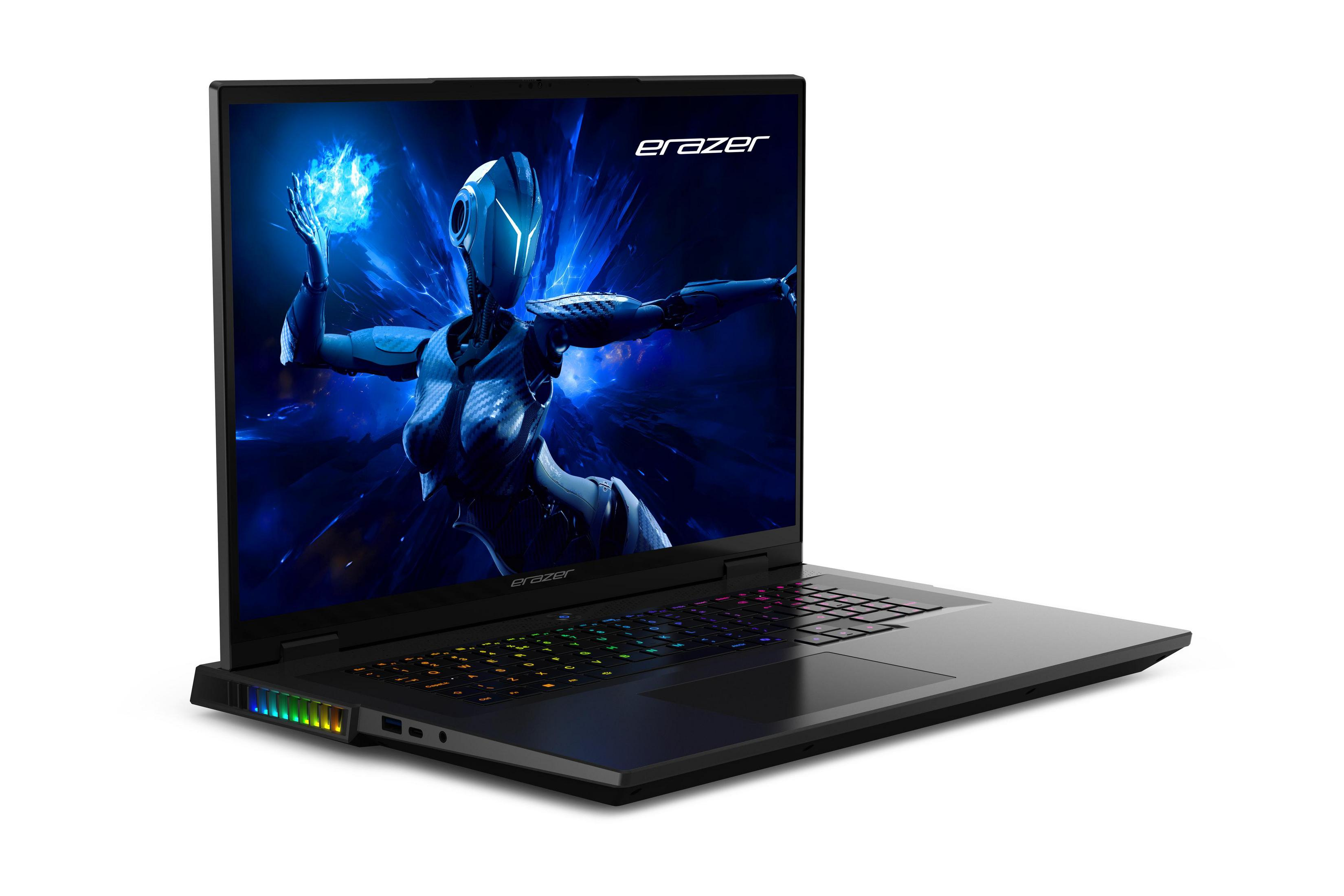 Schwarzer Erazer-Laptop mit Bildschirm, der eine futuristische Figur und eine farbenfrohe Tastatur zeigt, auf weißem Hintergrund.