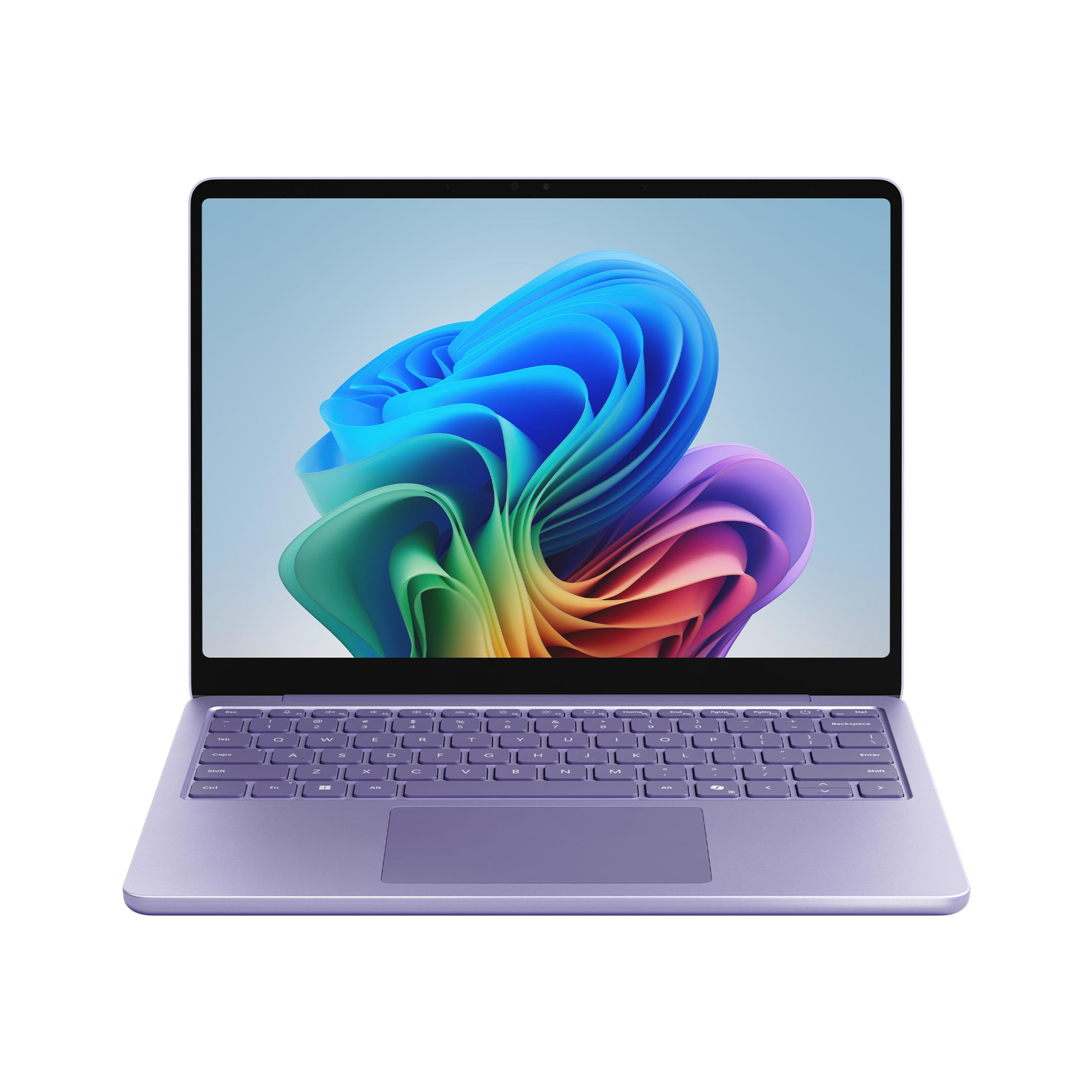 Fioletowy laptop jest otwarty, wyświetlając kolorowy, abstrakcyjny obraz. Klawiatura i touchpad są widoczne. Białe tło.