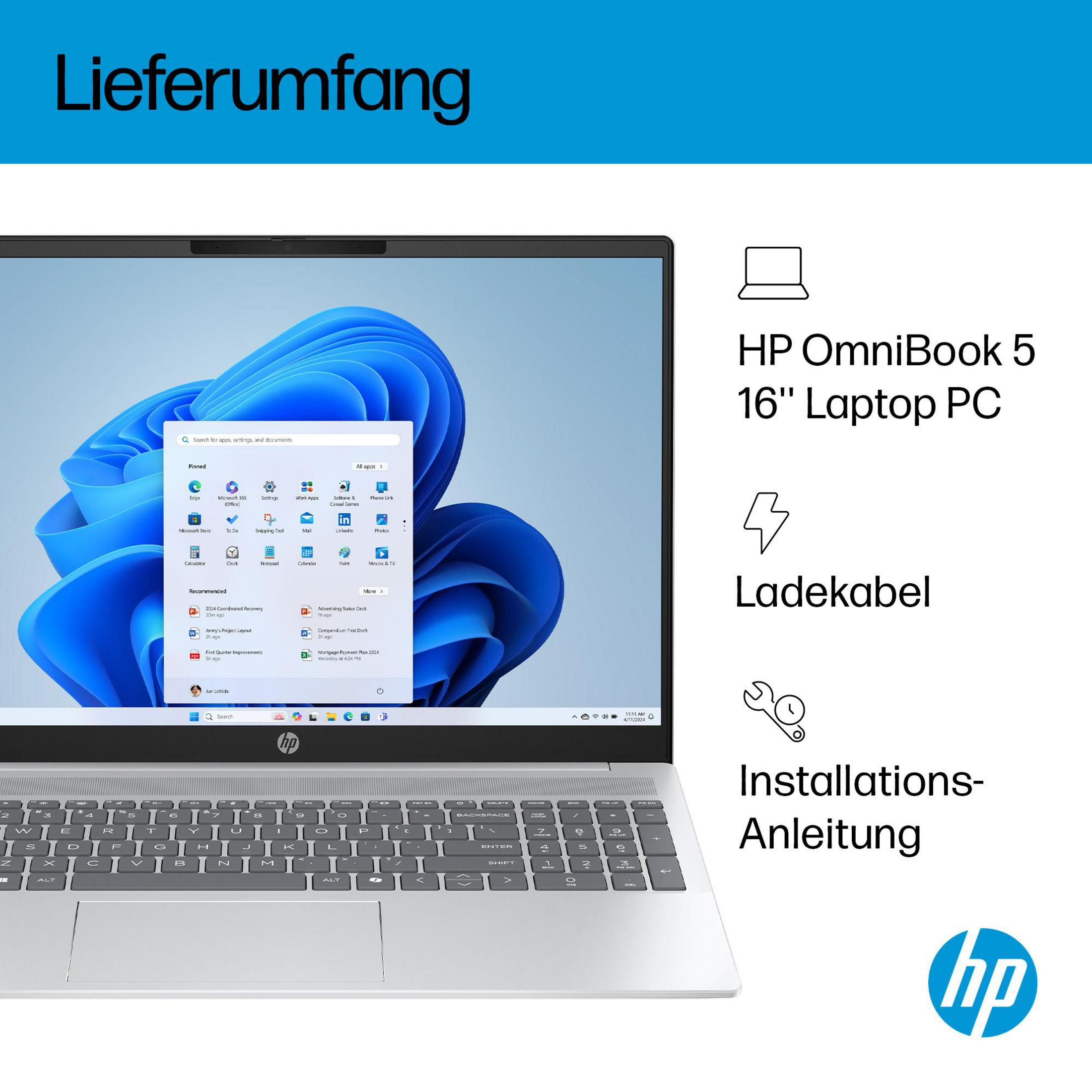 Ein Laptop mit geöffnetem Windows 11-Bildschirm, zusammen mit einem Ladegerät und einer Installationsanleitung.