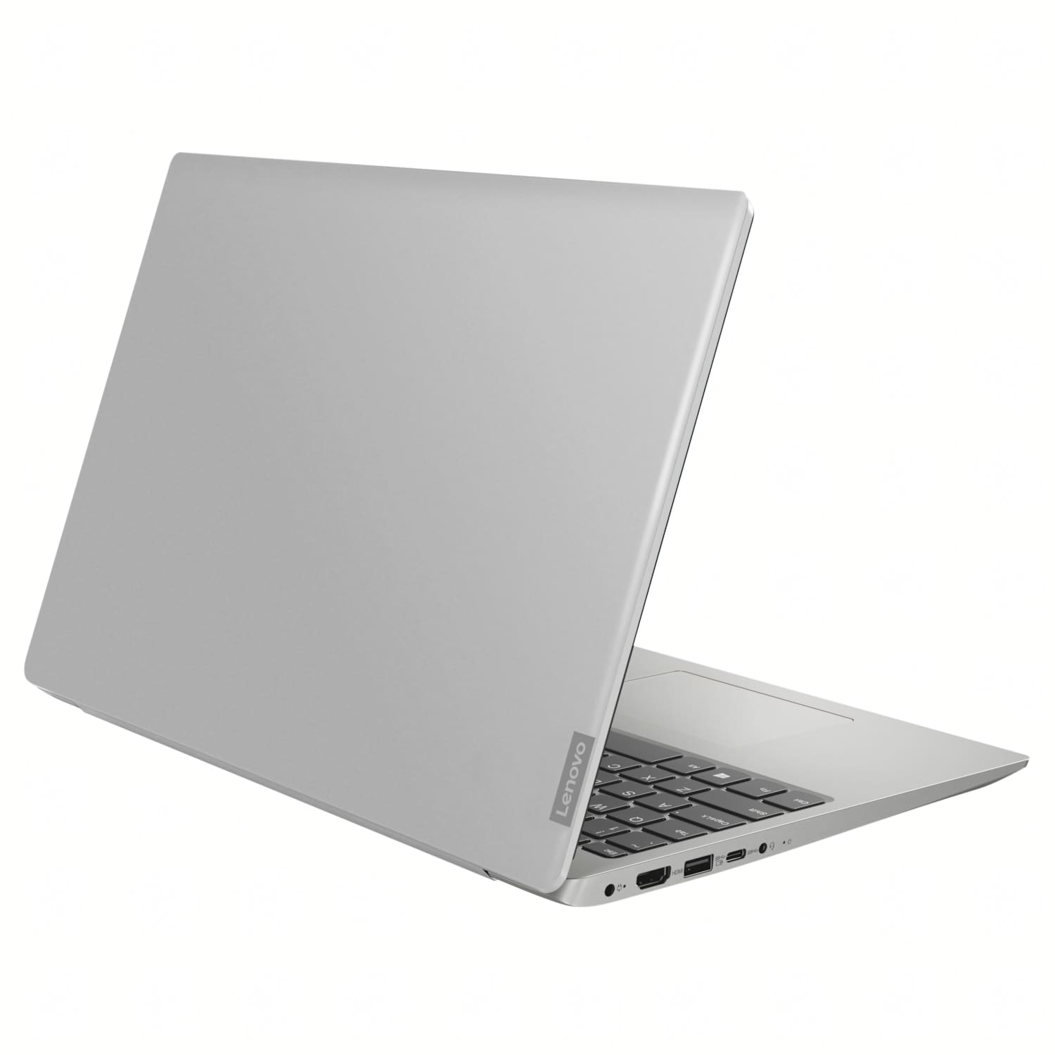 Un portátil Lenovo plateado está ligeramente abierto. El teclado es visible, con la pantalla al fondo. El portátil está sobre una superficie blanca.