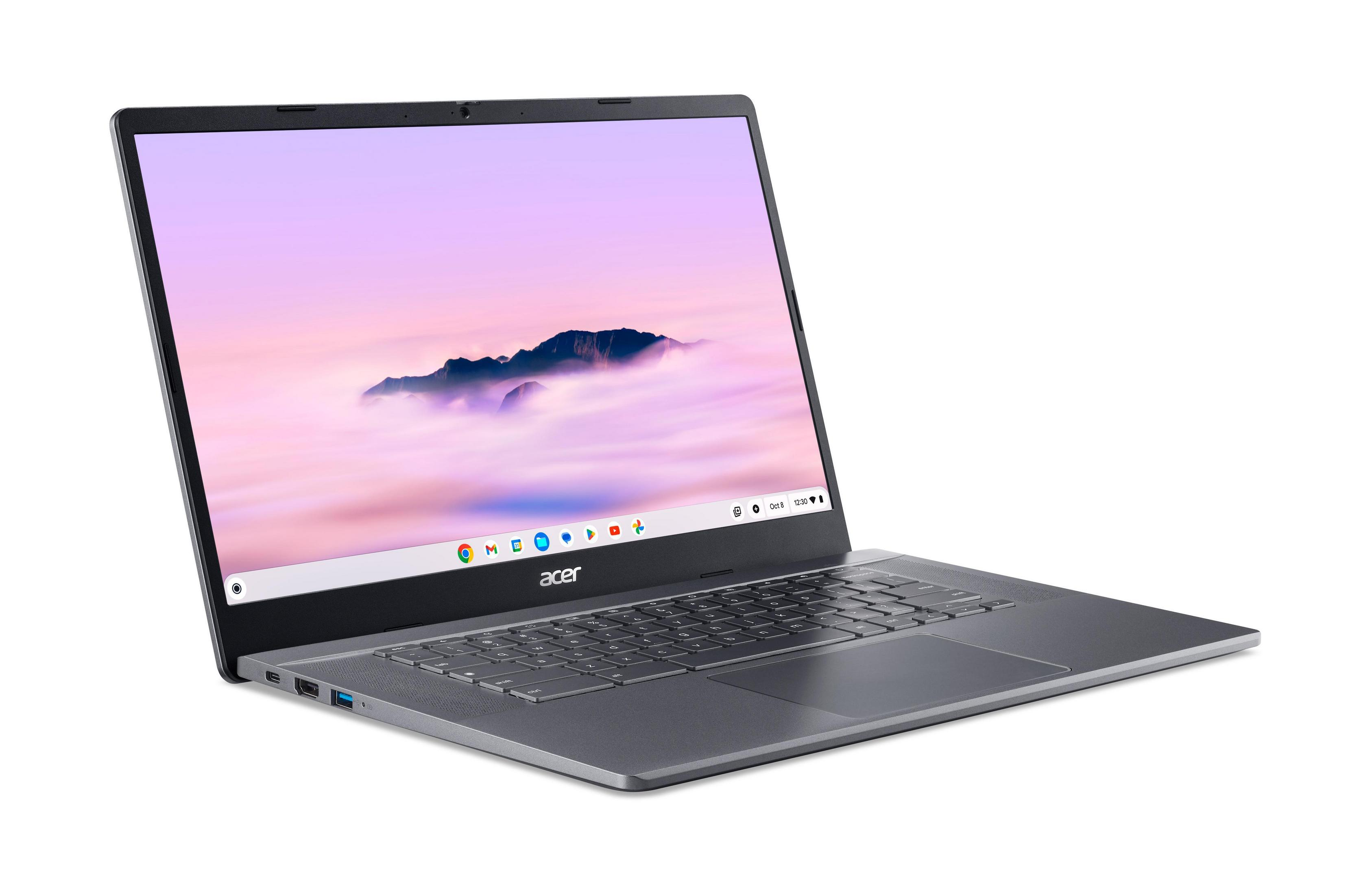 Ein graues Acer Chromebook ist geöffnet und zeigt einen bewölkten Himmel. Die Tastatur ist sichtbar und der Bildschirm hell.