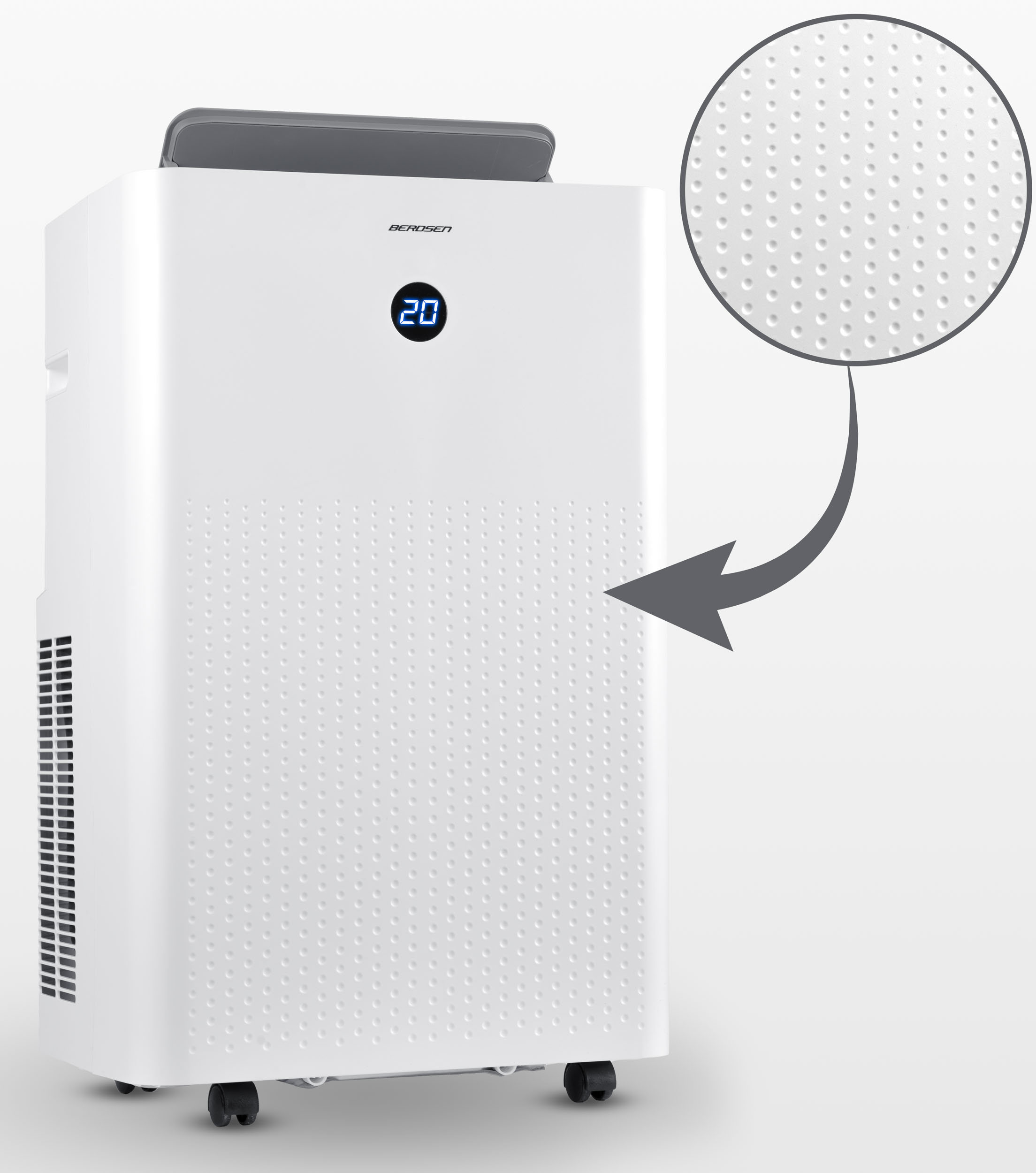 Biały klimatyzator z cyfrowym wyświetlaczem 20. Zbliżenie pokazuje kropkowaną teksturę. Urządzenie ma kółka.