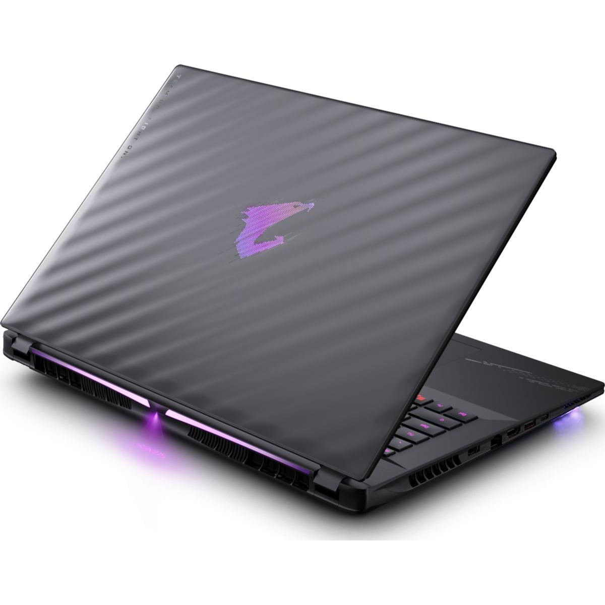 Ein dunkelgrauer Laptop mit lila Logo, geöffnet auf weißem Hintergrund. Die Tastatur ist sichtbar, die Kanten leuchten lila.