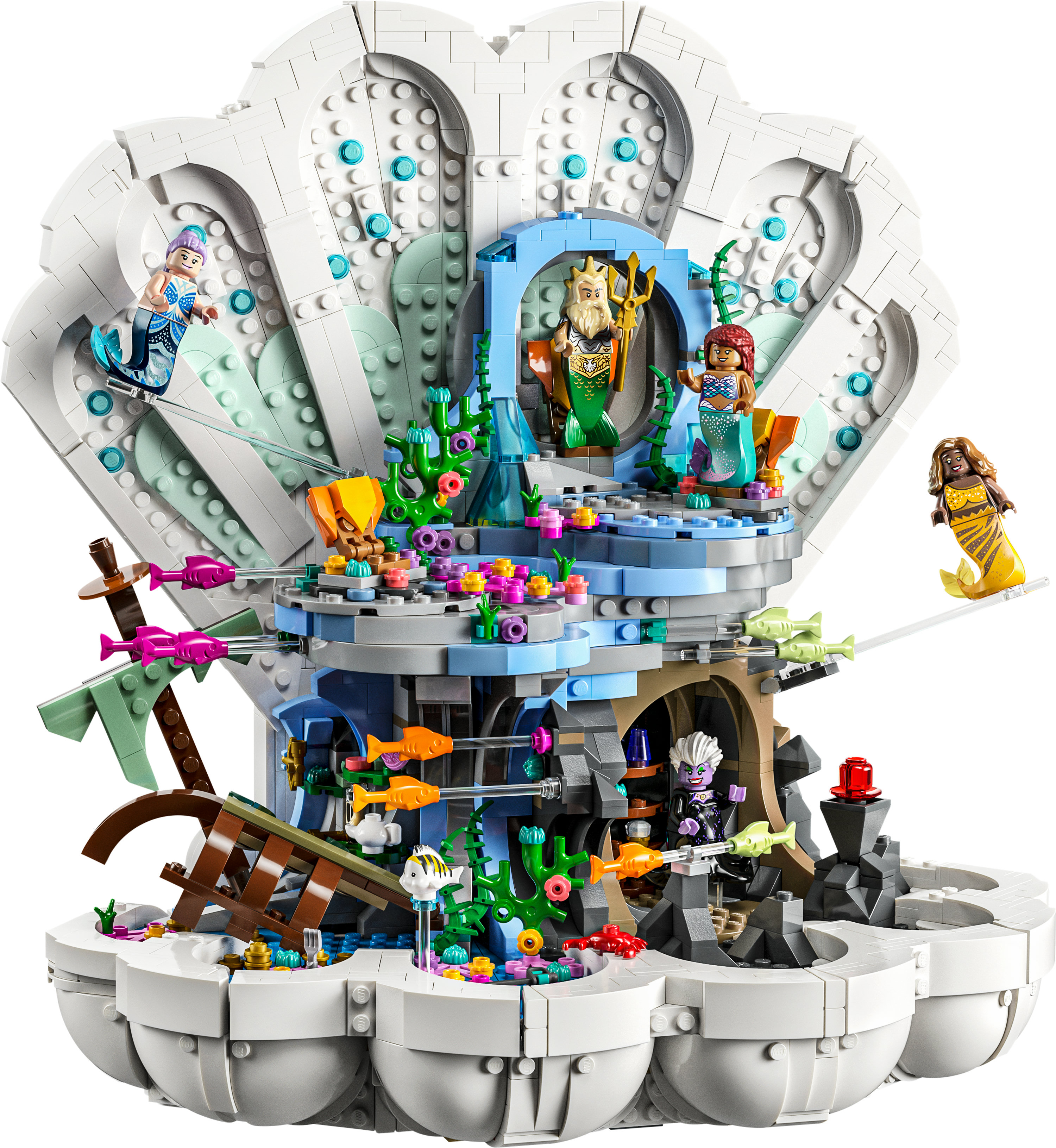 Een Lego schelp met zeemeerminfiguren en verschillende zeedieren.