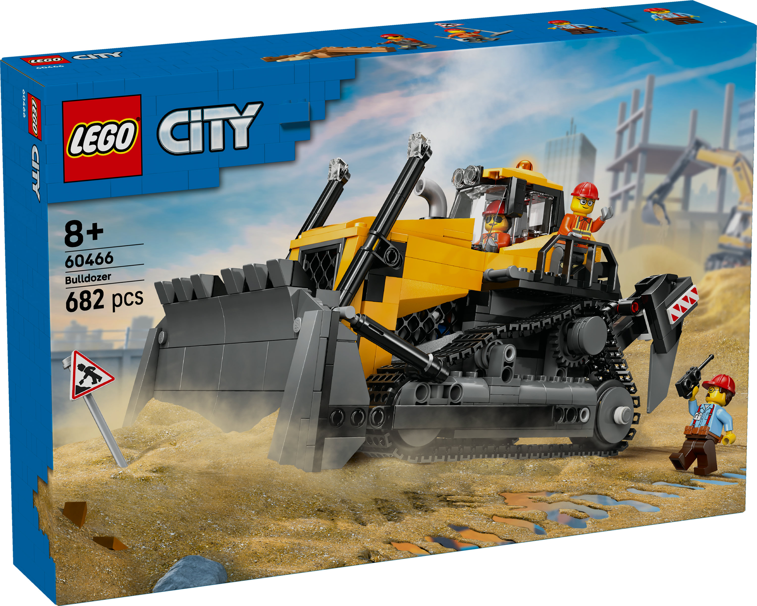 Pudełko Lego City buldożer. Żółty buldożer, robotnicy budowlani i znak z napisem „prace w toku”.