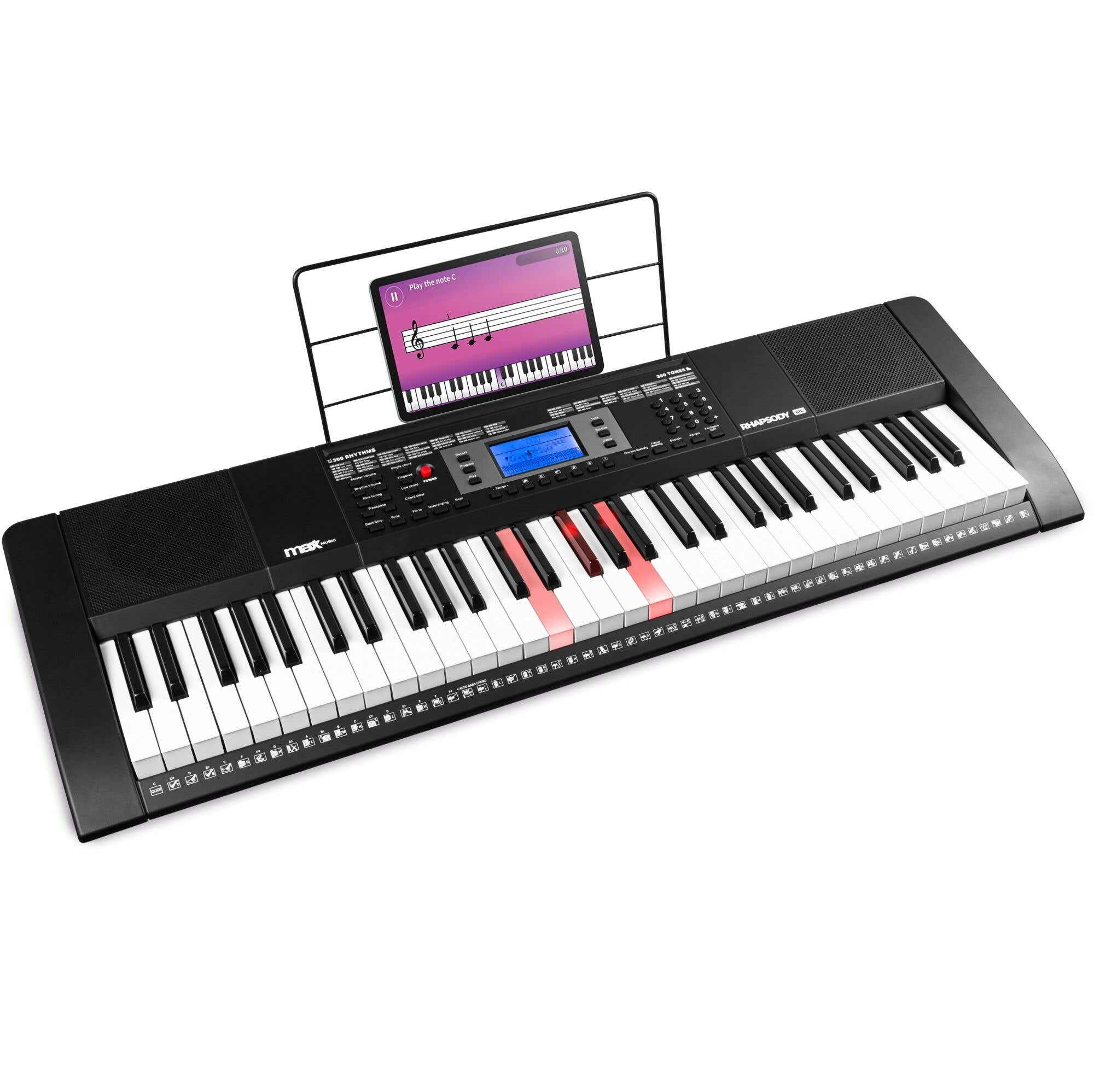 Zwart digitale piano met een tablet op een standaard en enkele toetsen rood verlicht.
