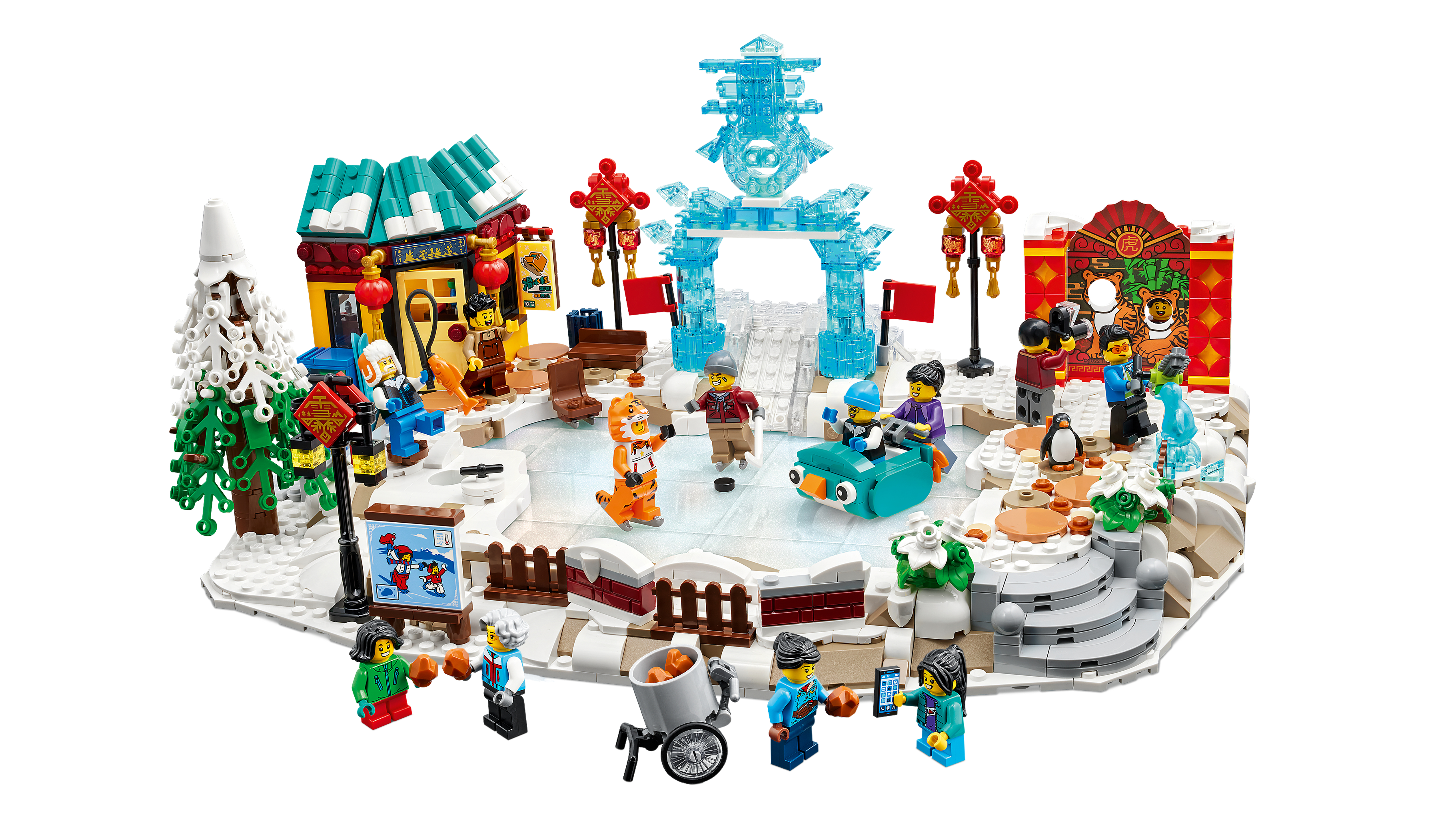 Una scena LEGO di un festival invernale con pista di pattinaggio, edifici, personaggi e vari elementi decorativi.