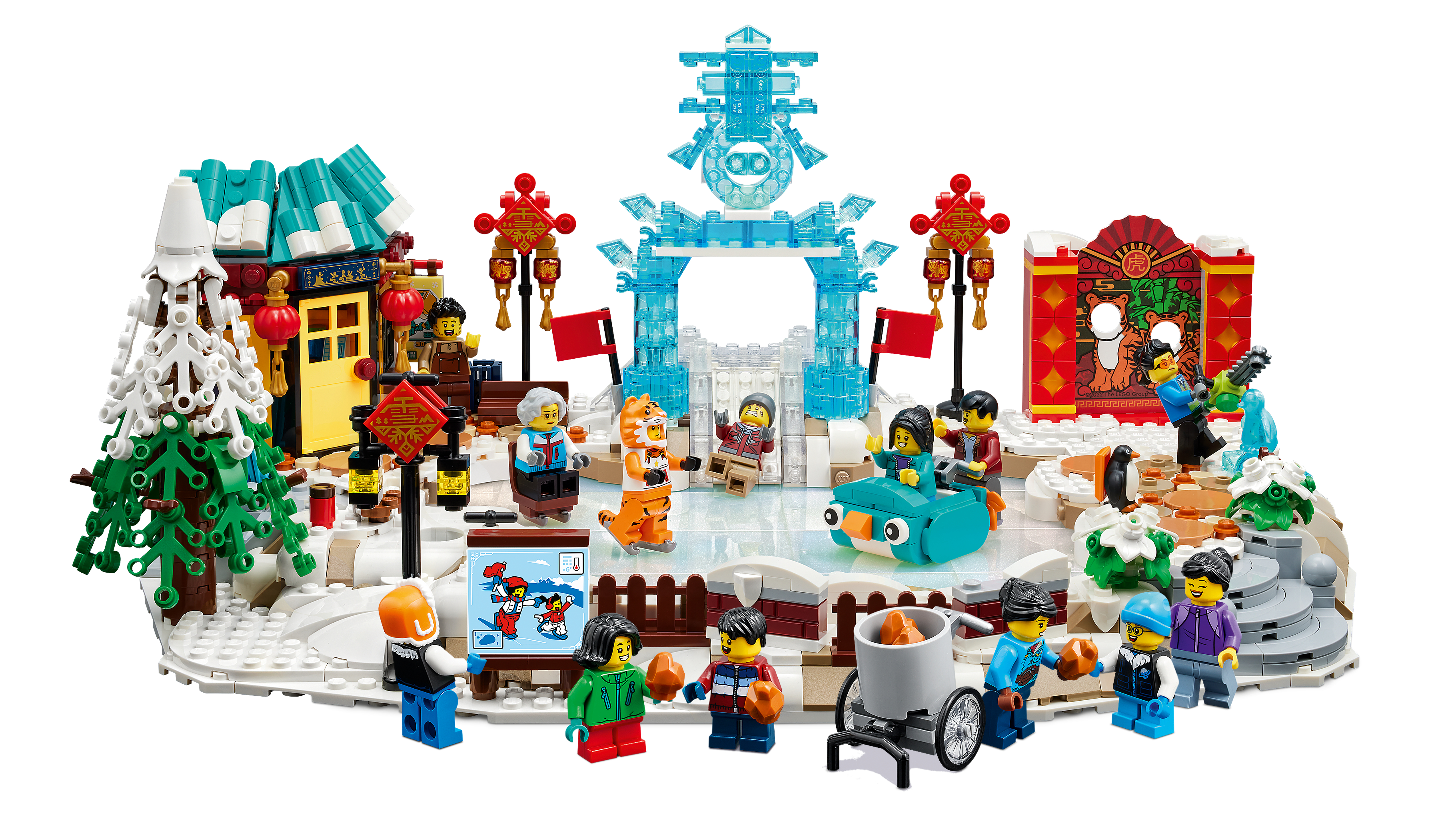 Una scena LEGO di un festival invernale con pista di pattinaggio, edifici, personaggi e vari elementi decorativi.