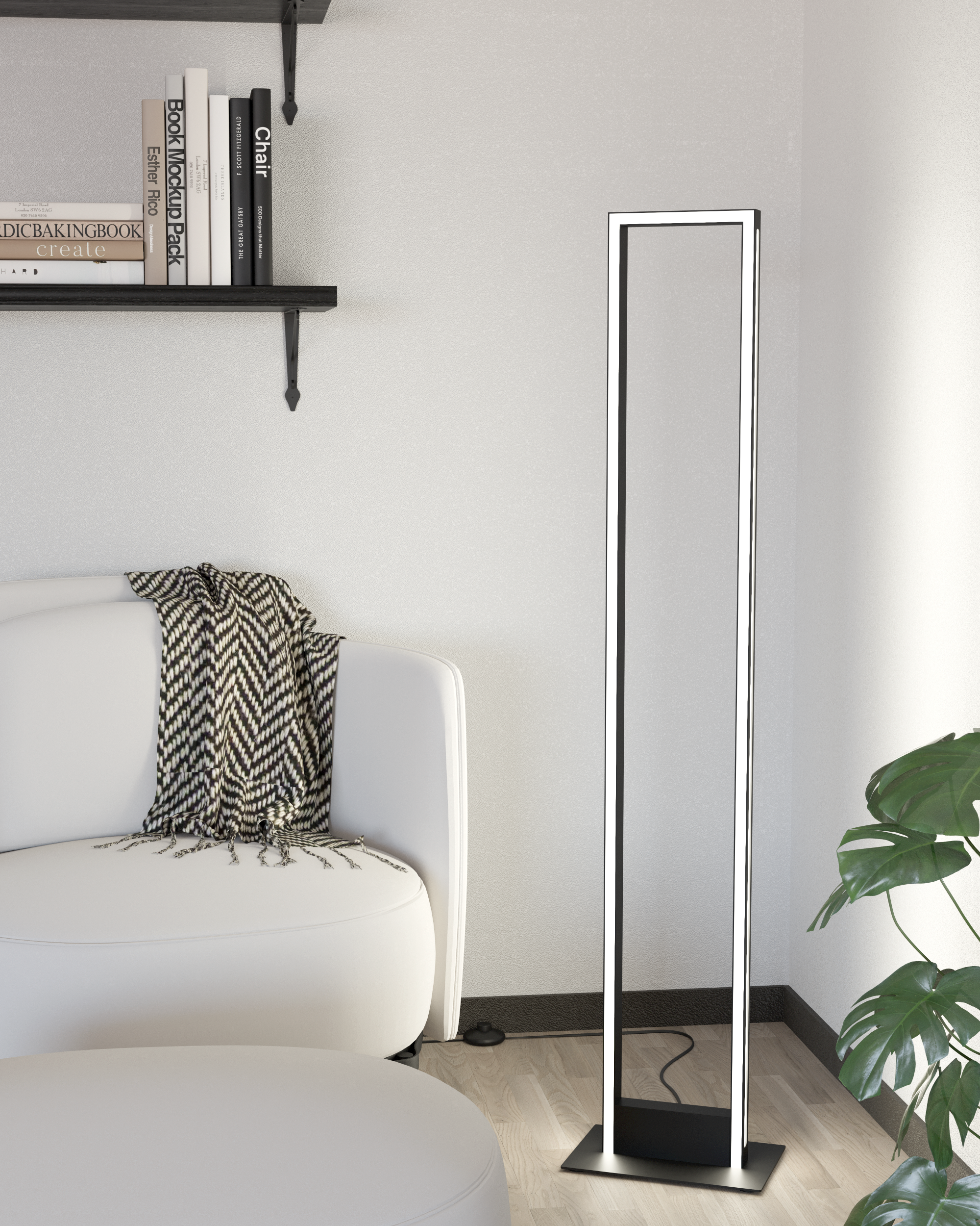 Ein modernes Wohnzimmer mit einem weißen Sofa, einer eleganten schwarzen Stehlampe und einer Pflanze.