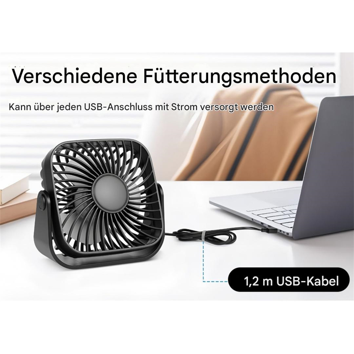 Ein schwarzer Mini-Ventilator, der über USB mit einem Laptop verbunden ist und seine Stromquelle und Portabilität auf einem weißen Schreibtisch zeigt.