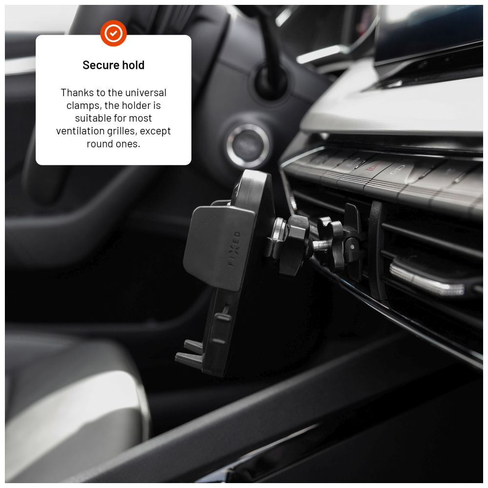 Eine schwarze Autohalterung ist an einem Lüftungsschlitz eines Autos befestigt und zeigt den Befestigungsmechanismus.