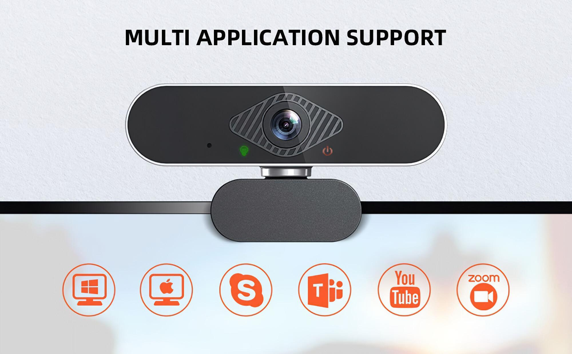 Nahaufnahme einer Webcam oben auf einem Monitor. Text: Multi-Anwendungsunterstützung und verschiedene App-Symbole.